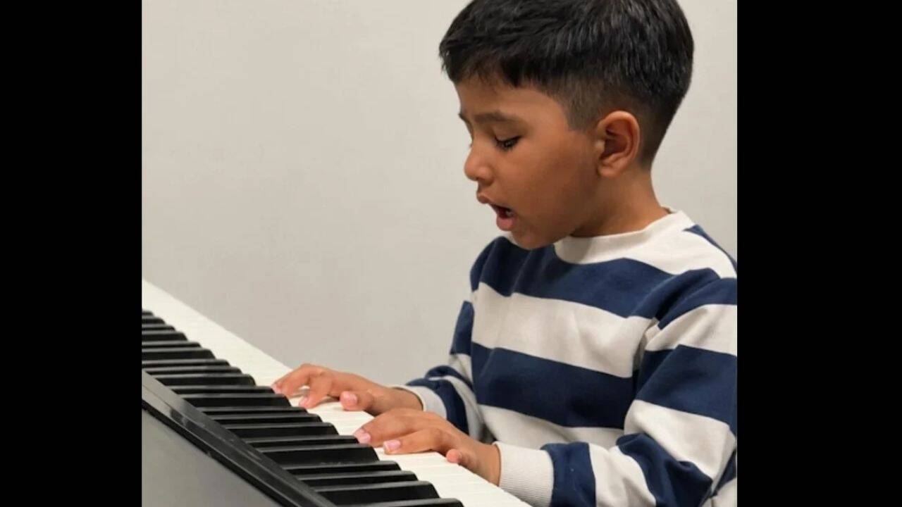 Arjun playing piano