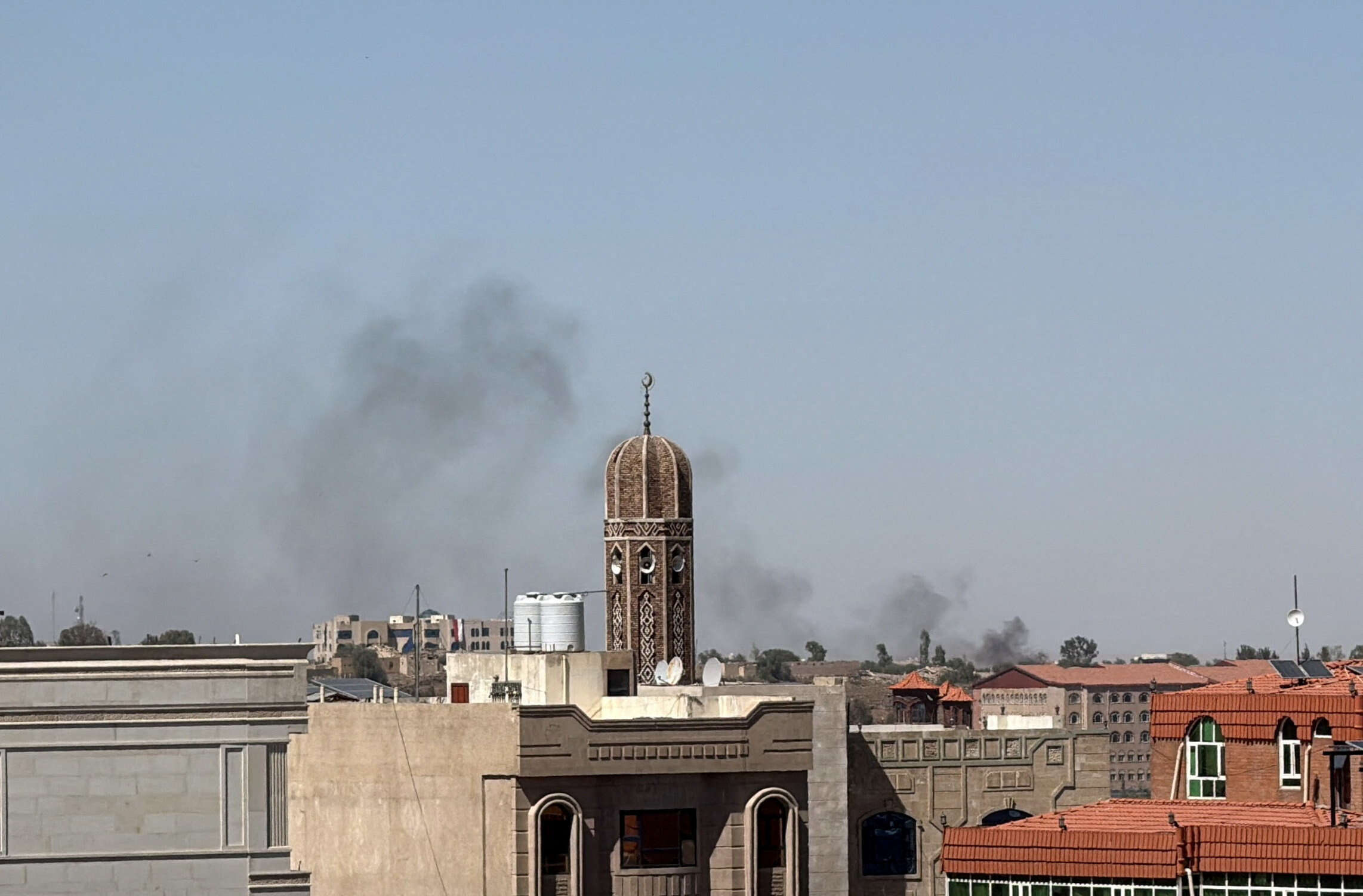 Smoke rises from the site of an airstrike in Sanaa