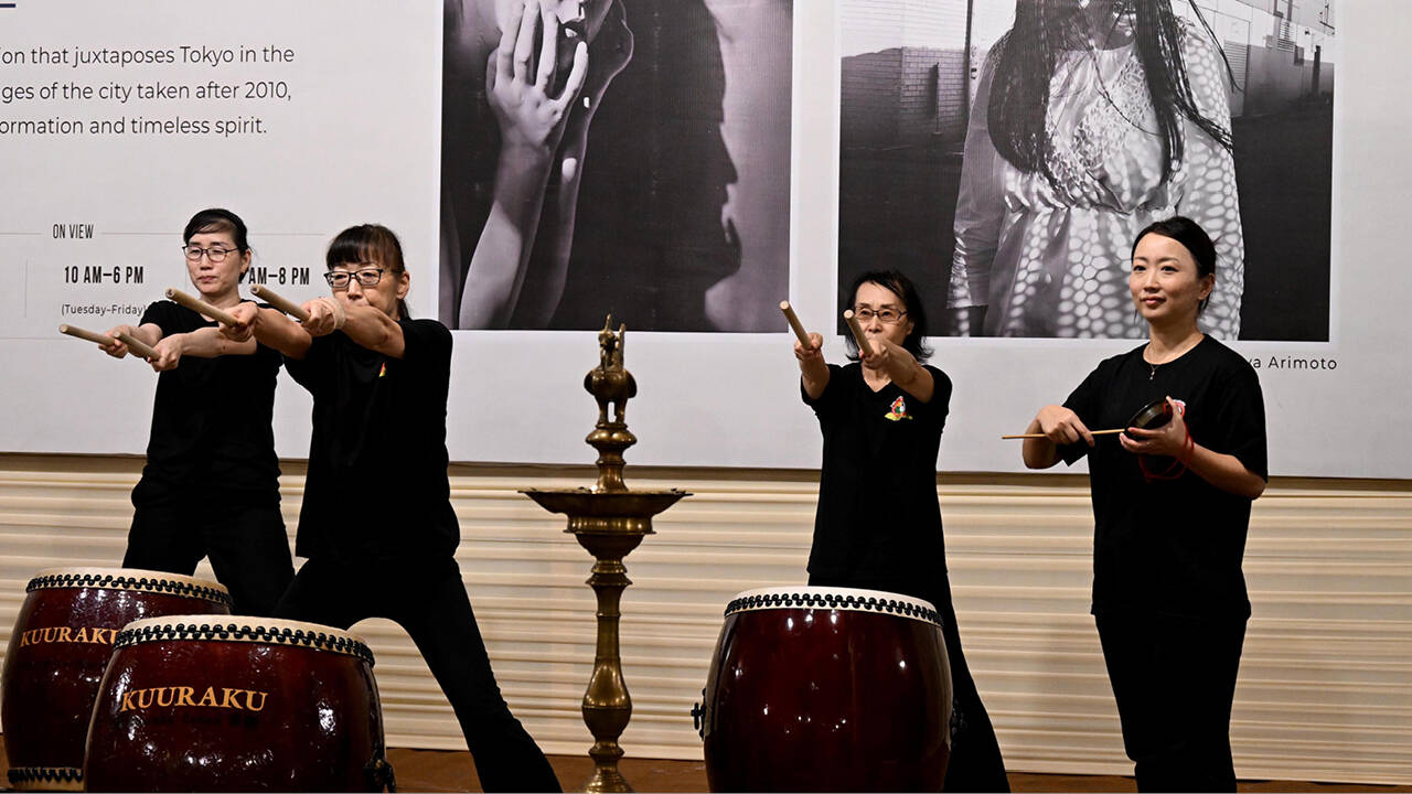 A troupe of Japanese women playing Taiko drums