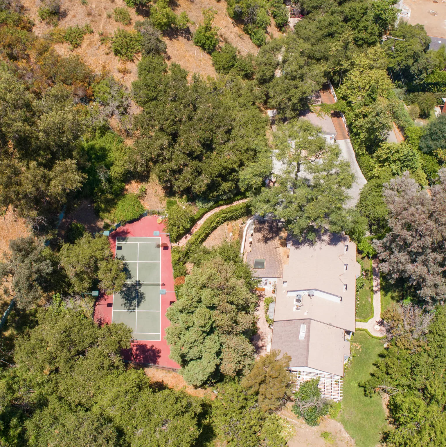 The estate retains an olive tree planted by Taylor Swift’s former boyfriend Calvin Harris.