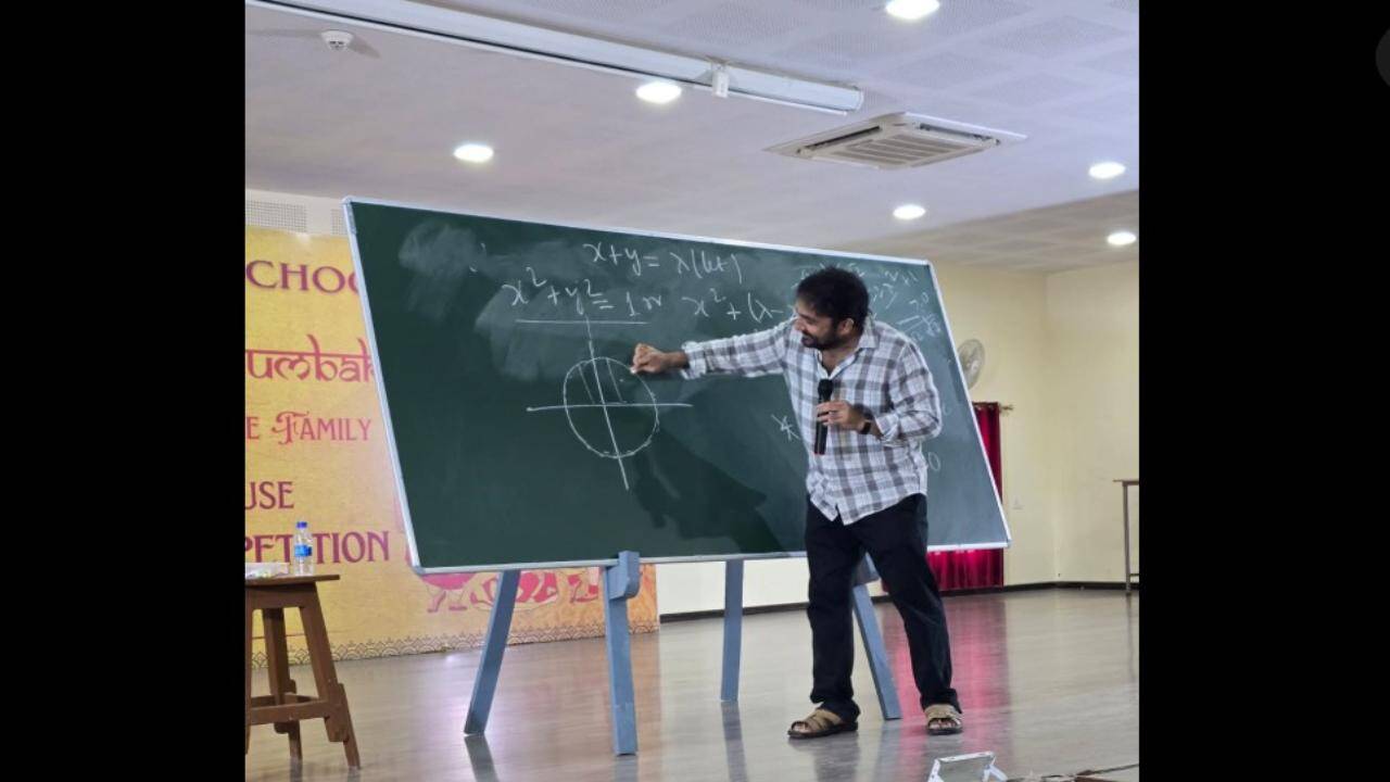 Anand teaching students