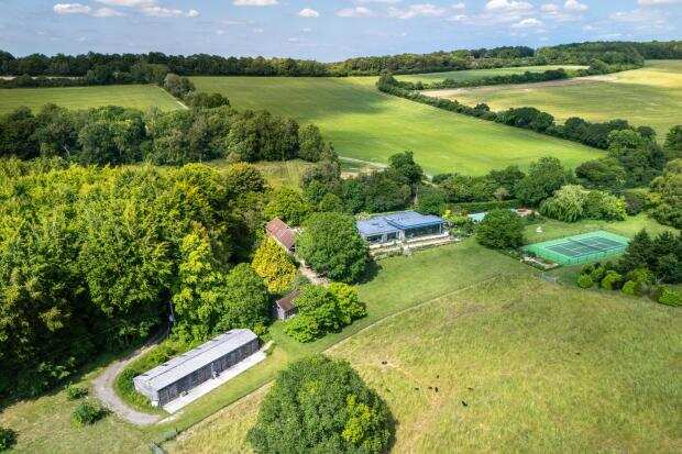 Belles Berry’s country home features a swimming pool and tennis court.