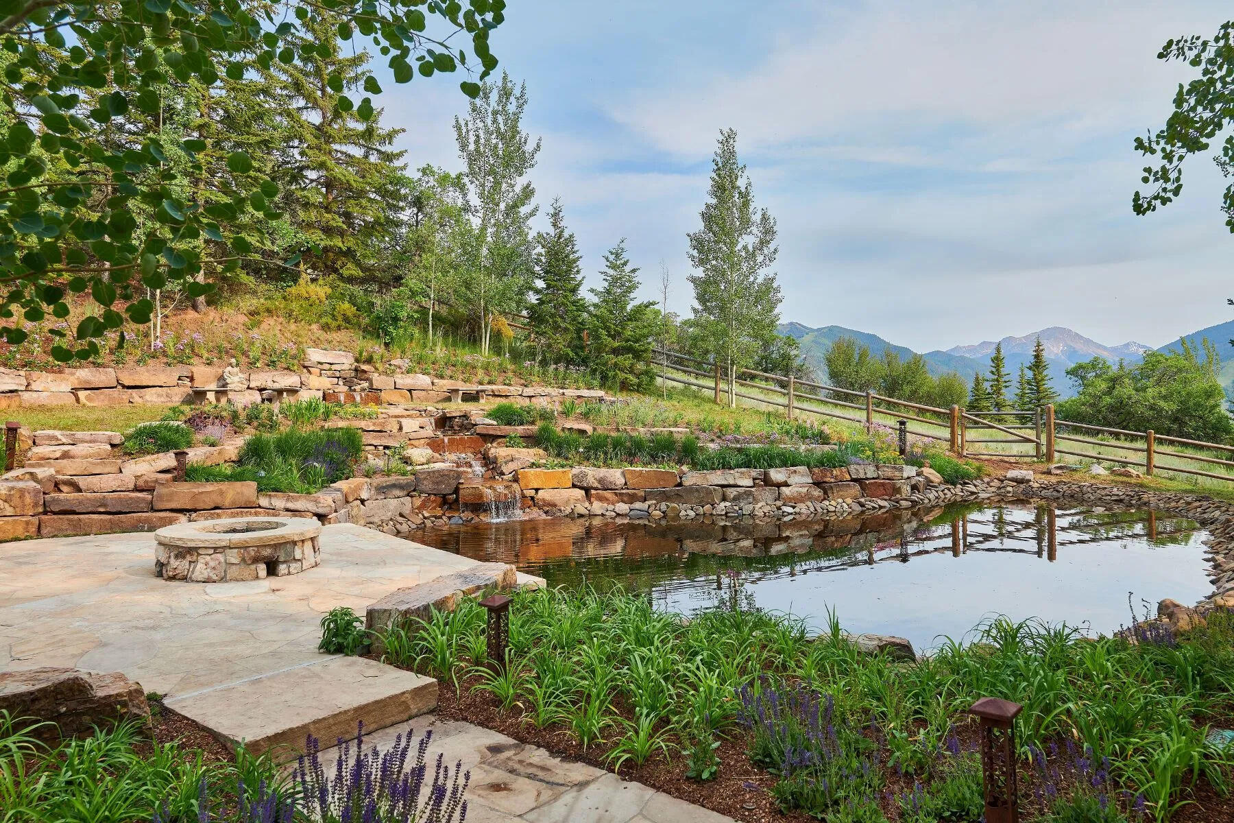 The renovated mansion features mountain views, an indoor pool, sauna and private cinema.