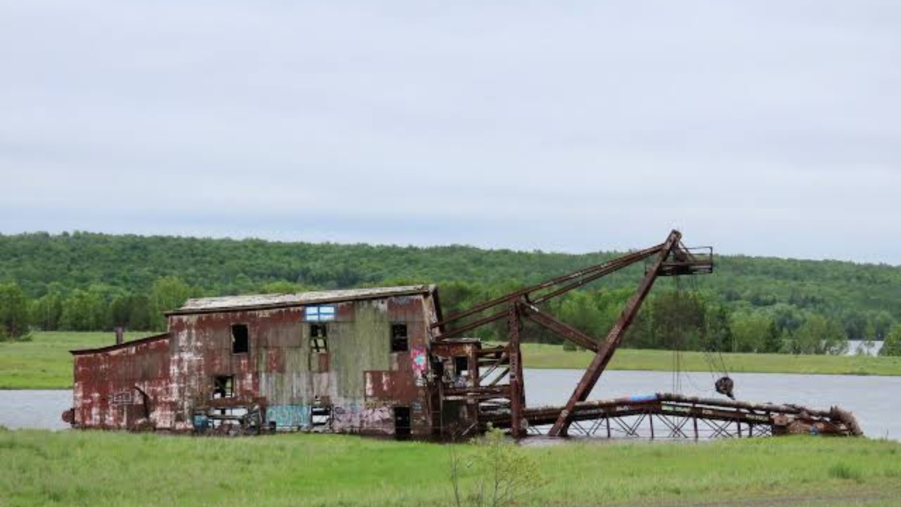 The beach area will be off limits for all of 2026, and boaters are advised to keep clear of equipment operating in the water (Image: MLive)<br>