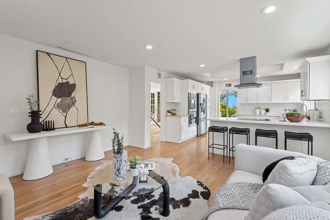 Nicholas Hoult slashes his home's asking price before finally selling the Hollywood Hills property for $2.2 million.