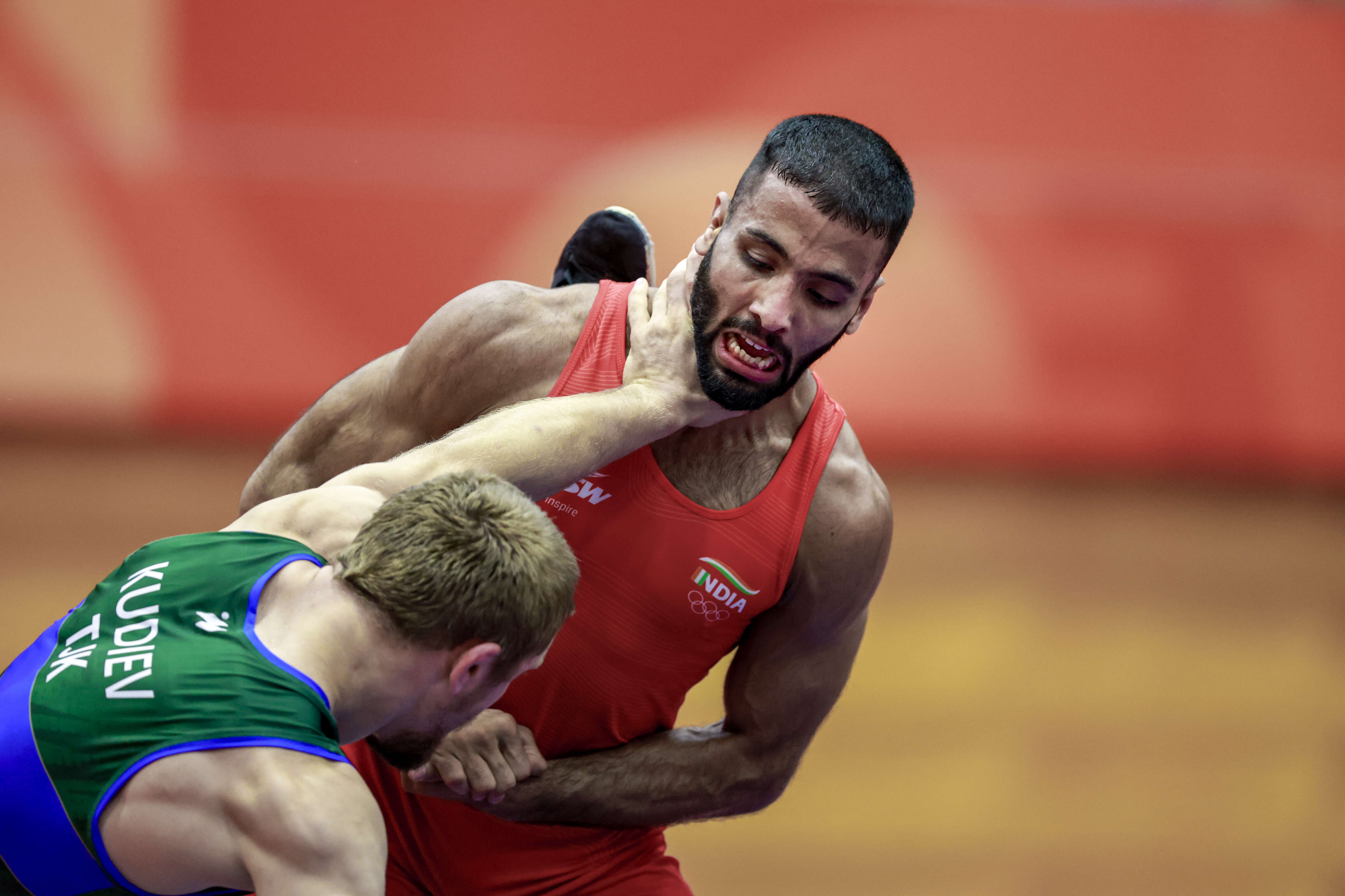 India's Sujeet Kalkal, right, competes in the final against Tajikistan's Abdulmazhid Kudiev in the Asian Games. (PTI Photo) Asian Games 2026: Wrestling