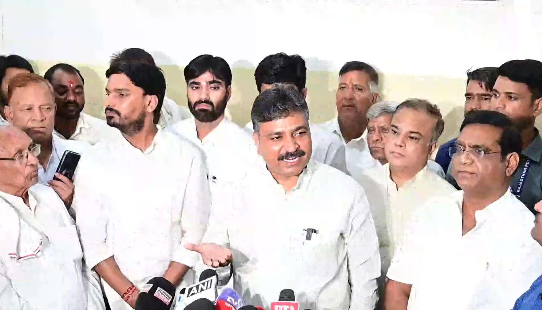PCC president Govind Singh Dotasra and LoP Tikaram Jully (3).jpg
