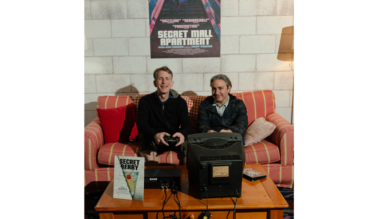 <br>Director Jeremy Workman (right) stands with artist Michael Townsend on April 27 beside a recreation of the secret apartment that Townsend and his fellow artists built inside Providence Place mall. (Sophie Park/For The Washington Post)