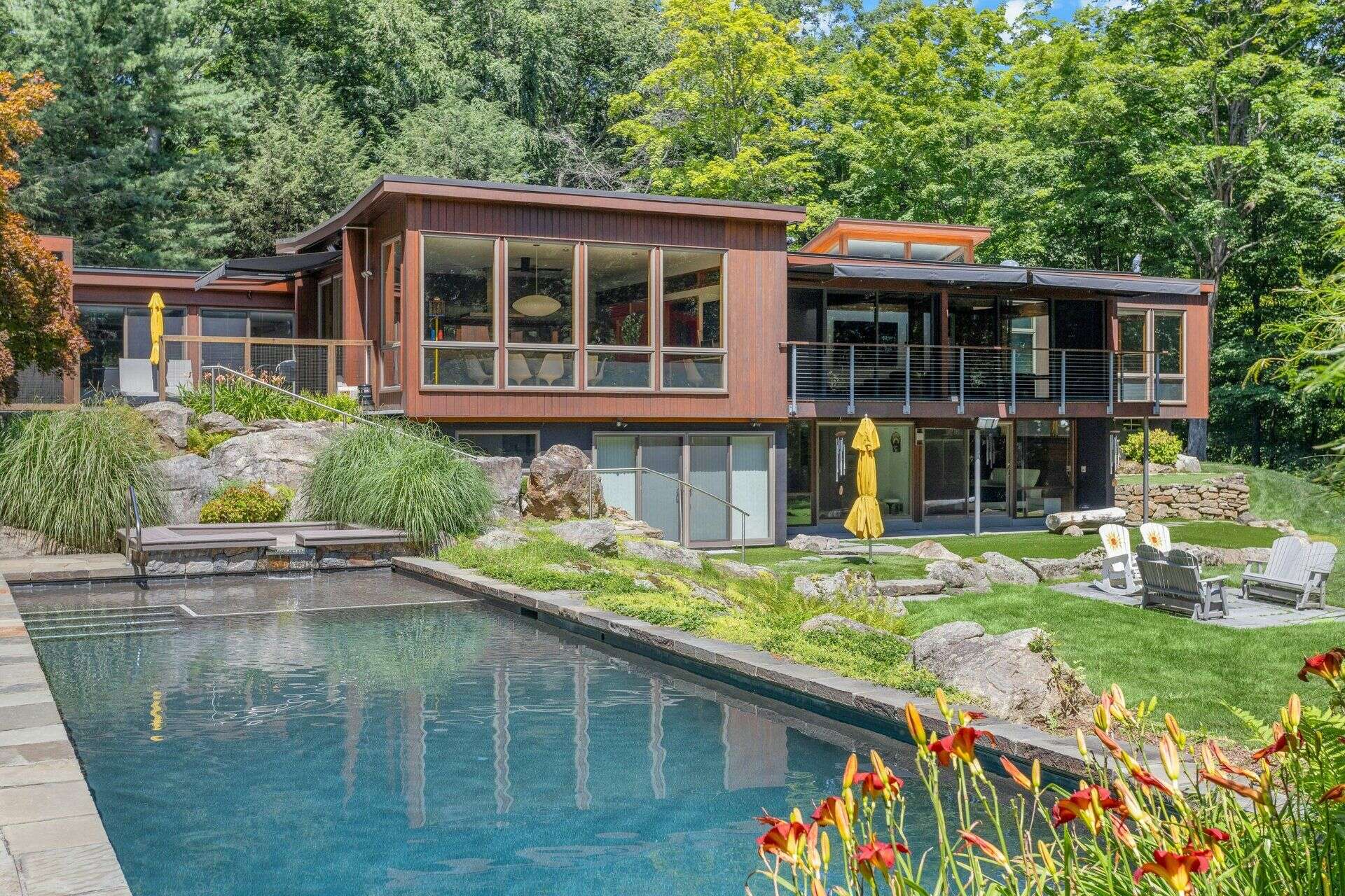 Their dog got sun shelves, umbrellas and a playground in this $3M home