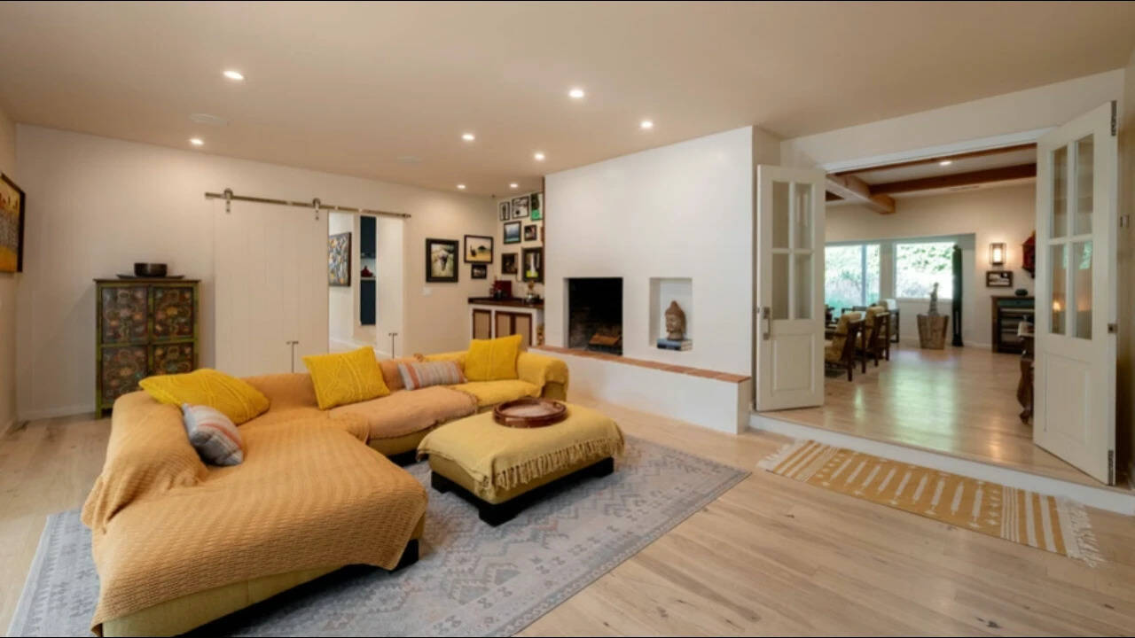 The interiors feature exposed wooden beams, handcrafted furnishings, artisan tile and a Caribbean-inspired colour palette
