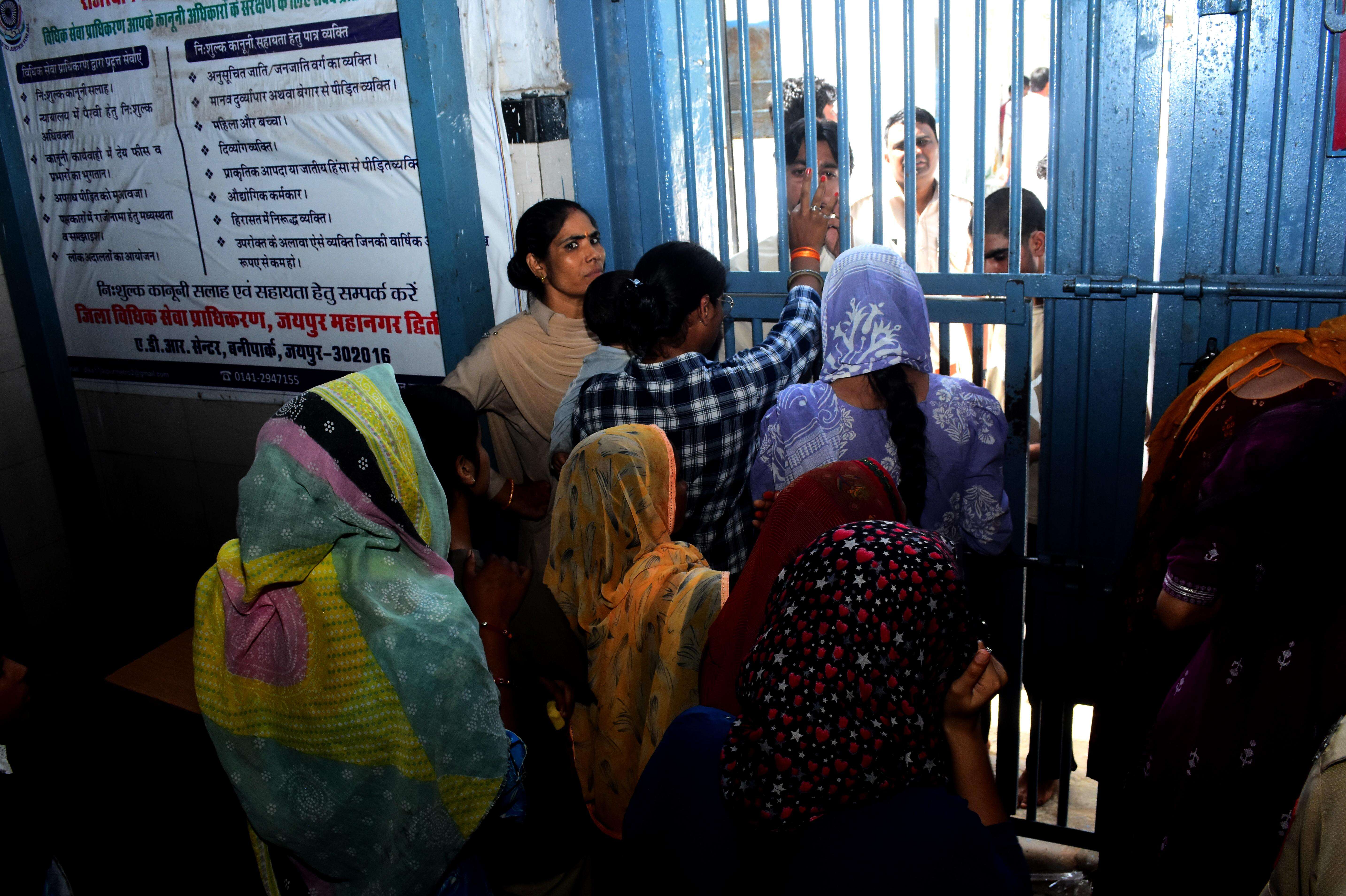 Sisters tie Rakhi to their brothers at Central Jail (2).jpeg