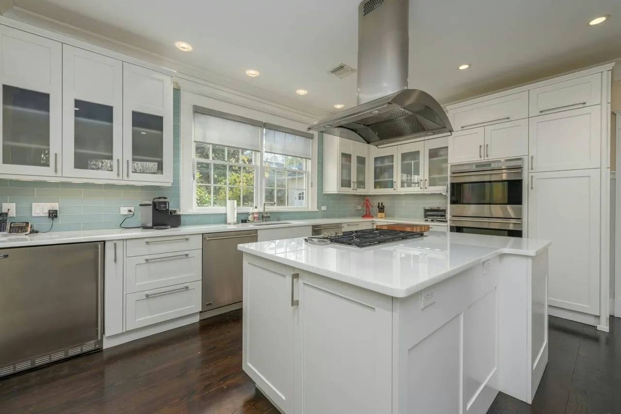 The Victorian property includes a chef’s kitchen, formal dining room, den, office and multiple fireplaces.