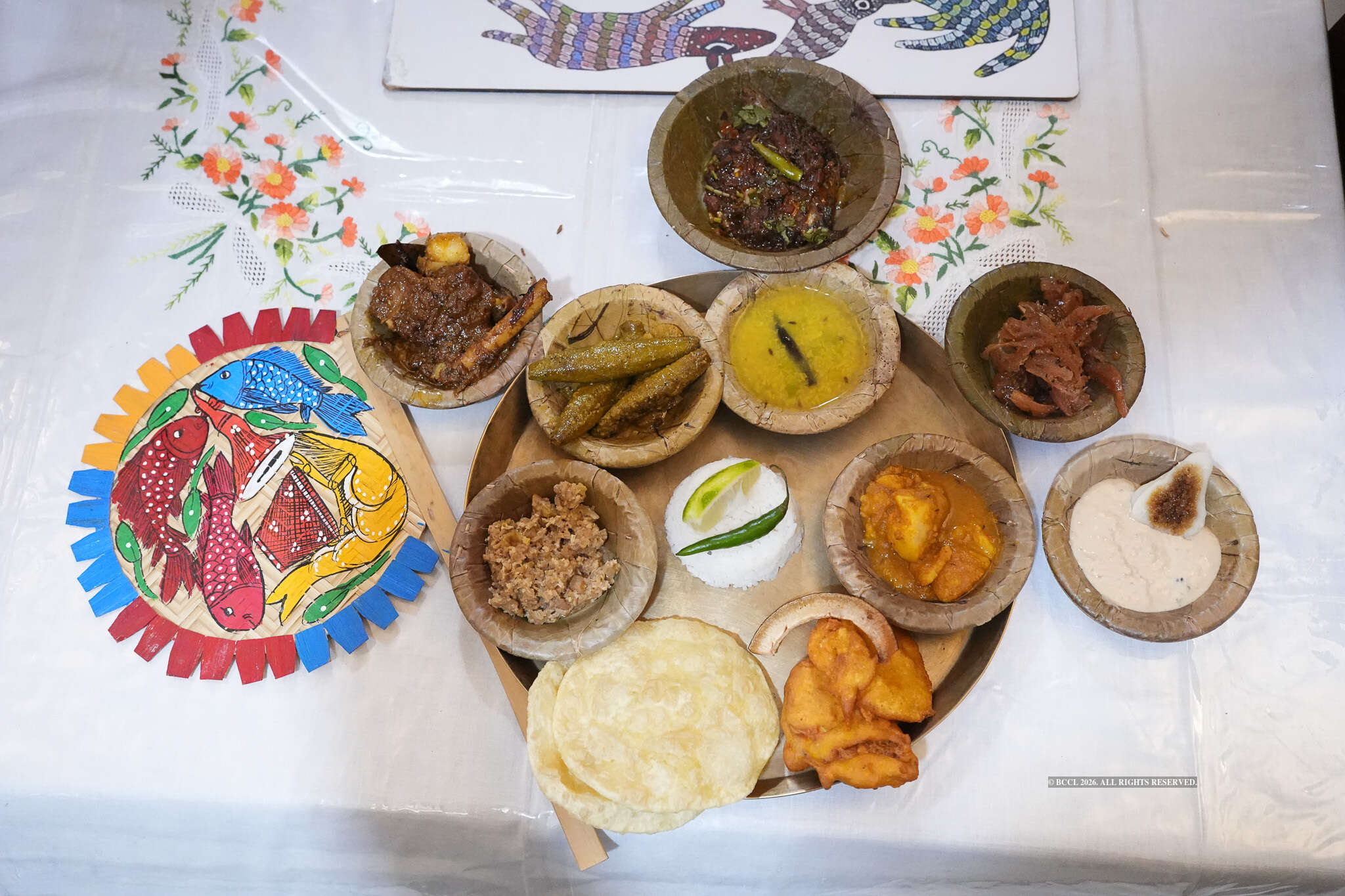 The spread at Luchee Food Story included seasonal dishes, including thor ghonto (banana stem subji), potol made with a fennel preparation, alur dum, chalta (elephant apple) chatney, tele bhaja (fritters), pithe with payesh made of black rice