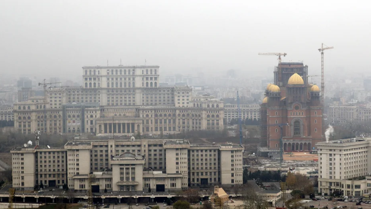 About 10,000 homes were demolished, around 20 churches were destroyed and 57,000 families were moved as the area was cleared for the palace.