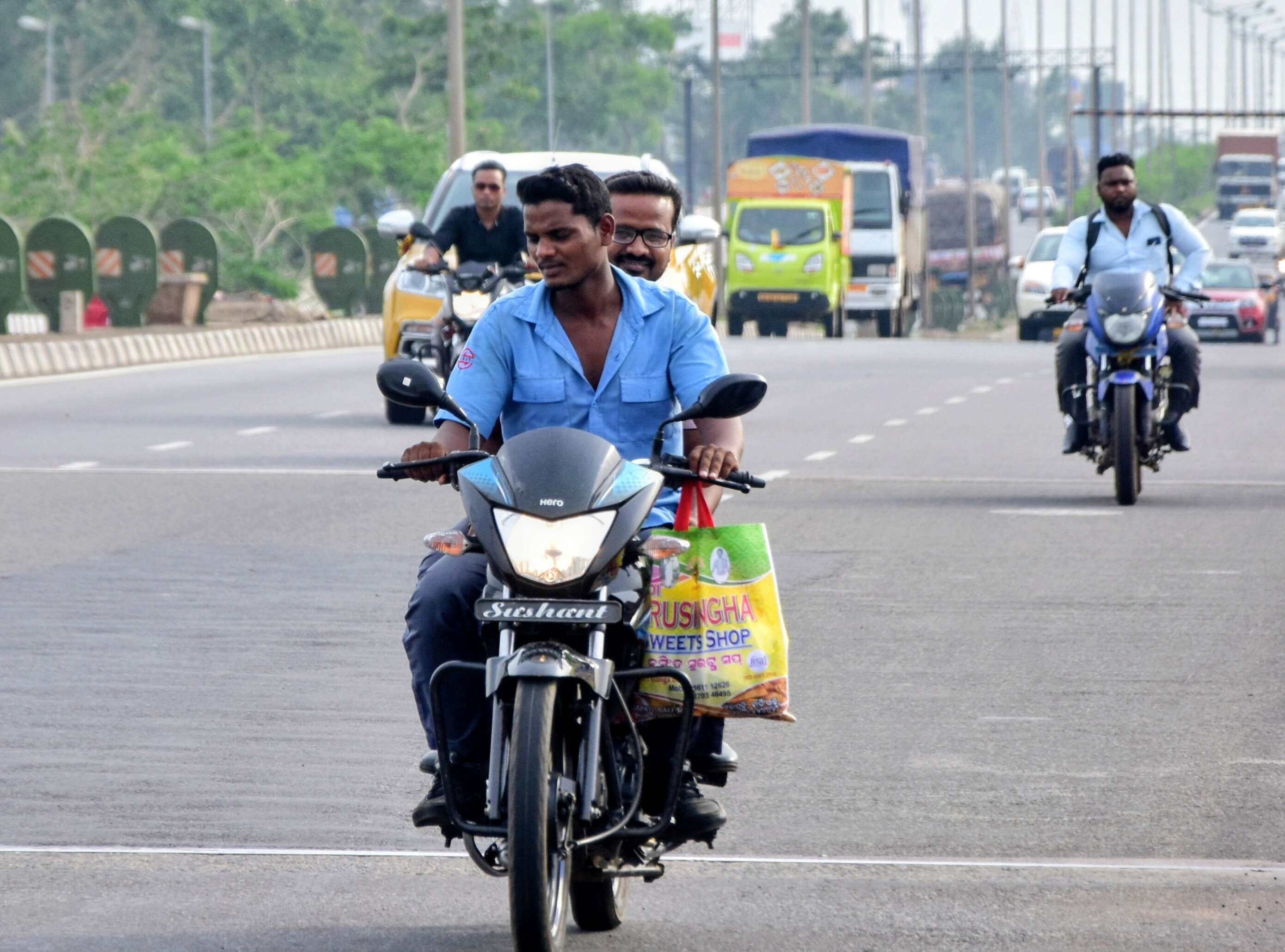 e8afcc2d-e332-4a2b-b1ca-103e9bc2f544_Photo23_Odisha_BHU_file_helmet_less_driving_in_the_city2.jpg