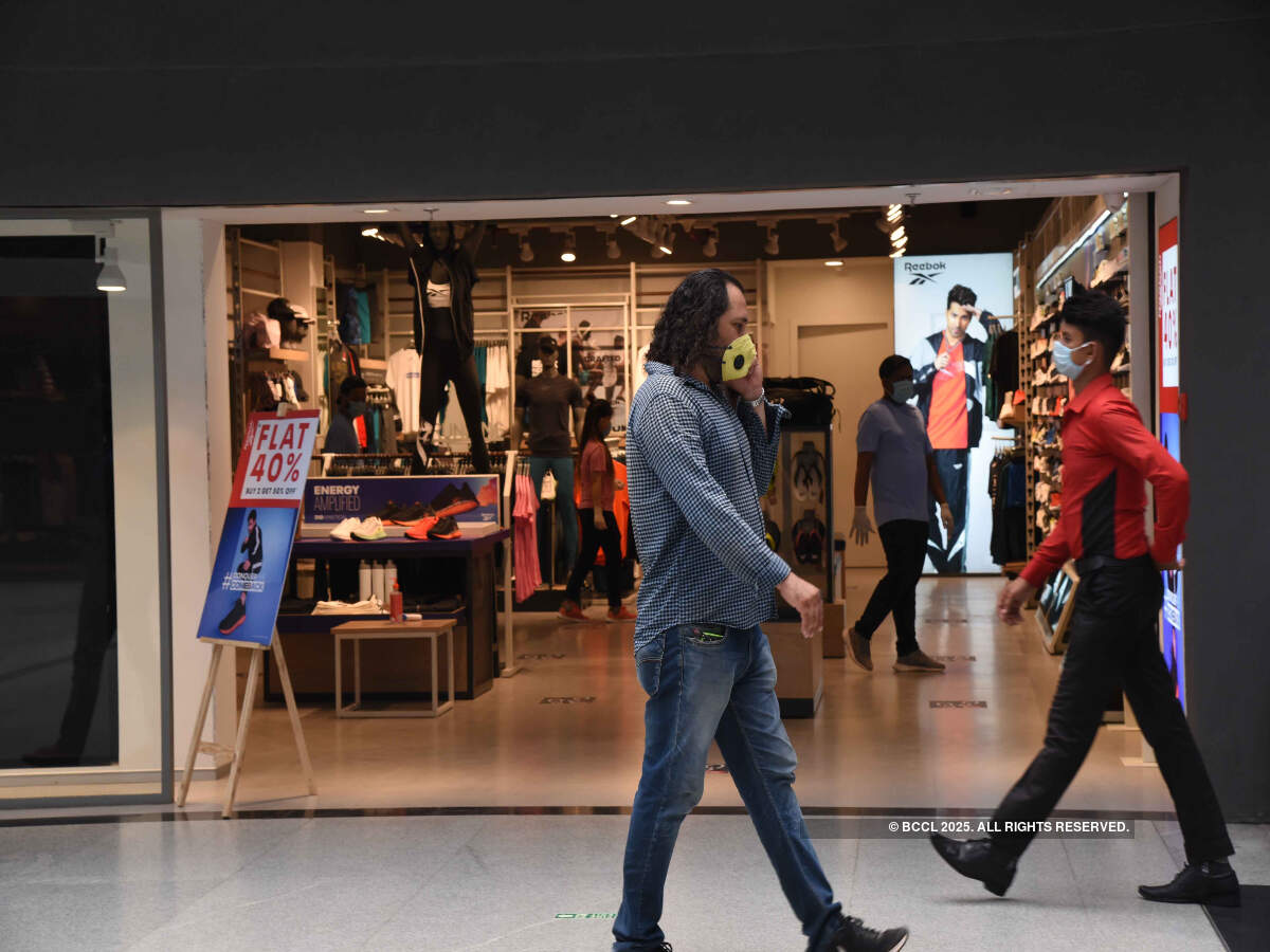 Shoppers were seen wearing masks and maintaining social distancing