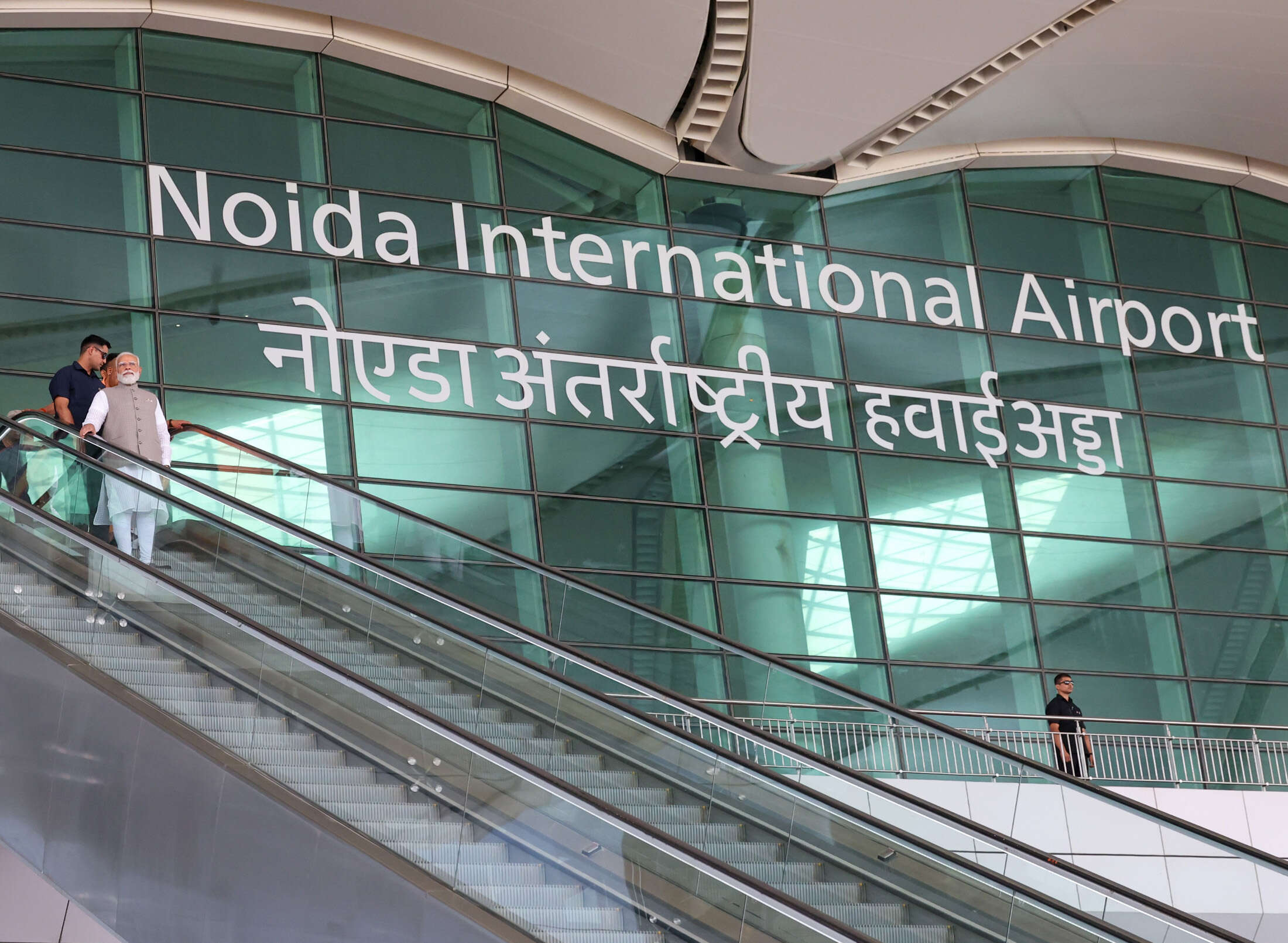 Noida International Airport is experiencing a slower operational start than anticipated.  This is due to competition from Delhi's Indira Gandhi International Airport.