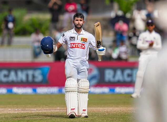 Sonal Dinusha celebrates his century on day five of the second Test cricket match between India and Sri Lanka, in Colombo, Sri Lanka. (PTI)
