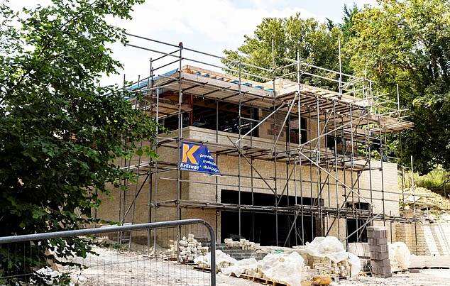 More than 100 locals oppose the controversial Bath mansion, claiming it has deviated significantly from Bath and North East Somerset Council-approved plans.