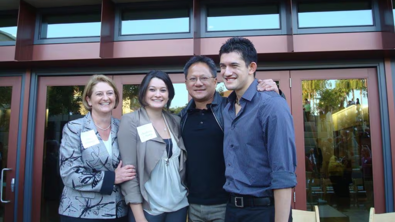 An old photo of Nvidia CEO Jensen Huang with his wife and his children, Madison and Spencer.