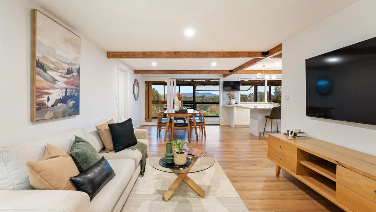 Inside, the home had two substantial living areas, high vaulted ceilings, an open fireplace and an enclosed outdoor entertaining deck