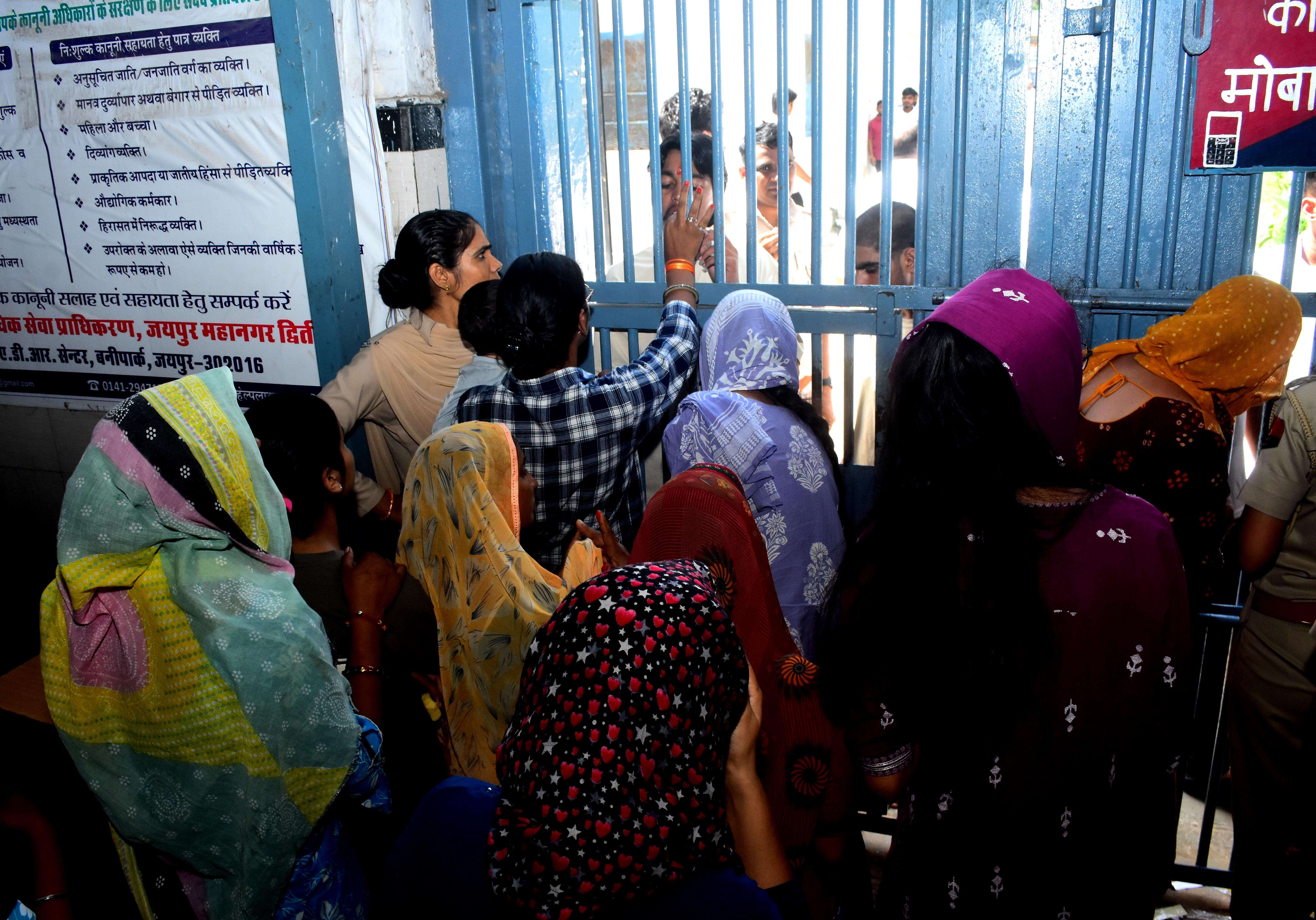 Sisters tie Rakhi to their brothers at Central Jail (1).jpeg