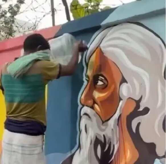 A rickshaw puller cleaned the image