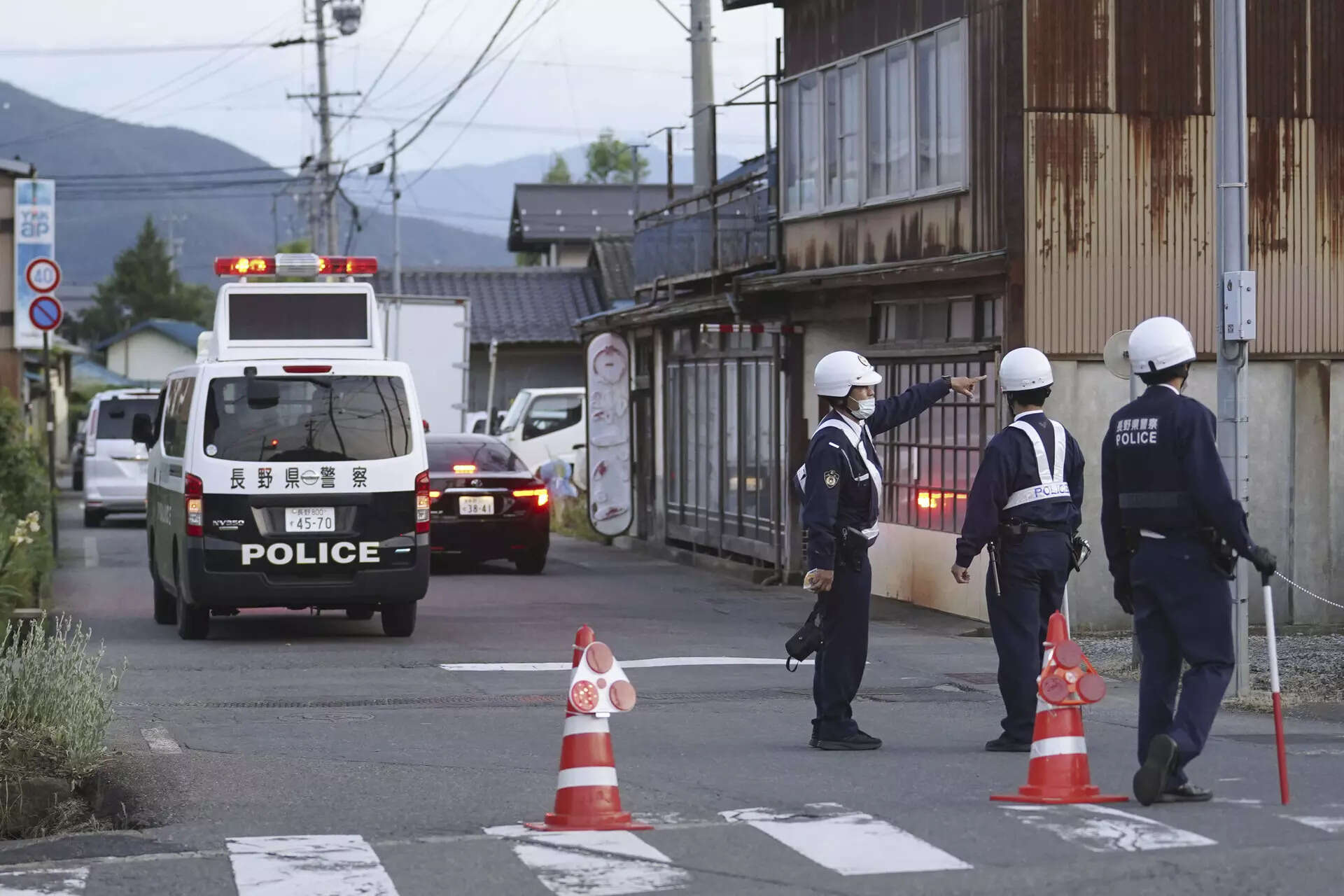 Suspect held after 4 killed in Japan gun and knife attack