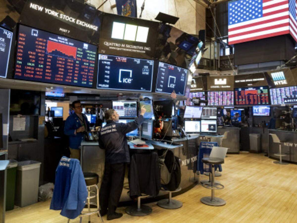 US stocks close mixed as market weighs lower default risk