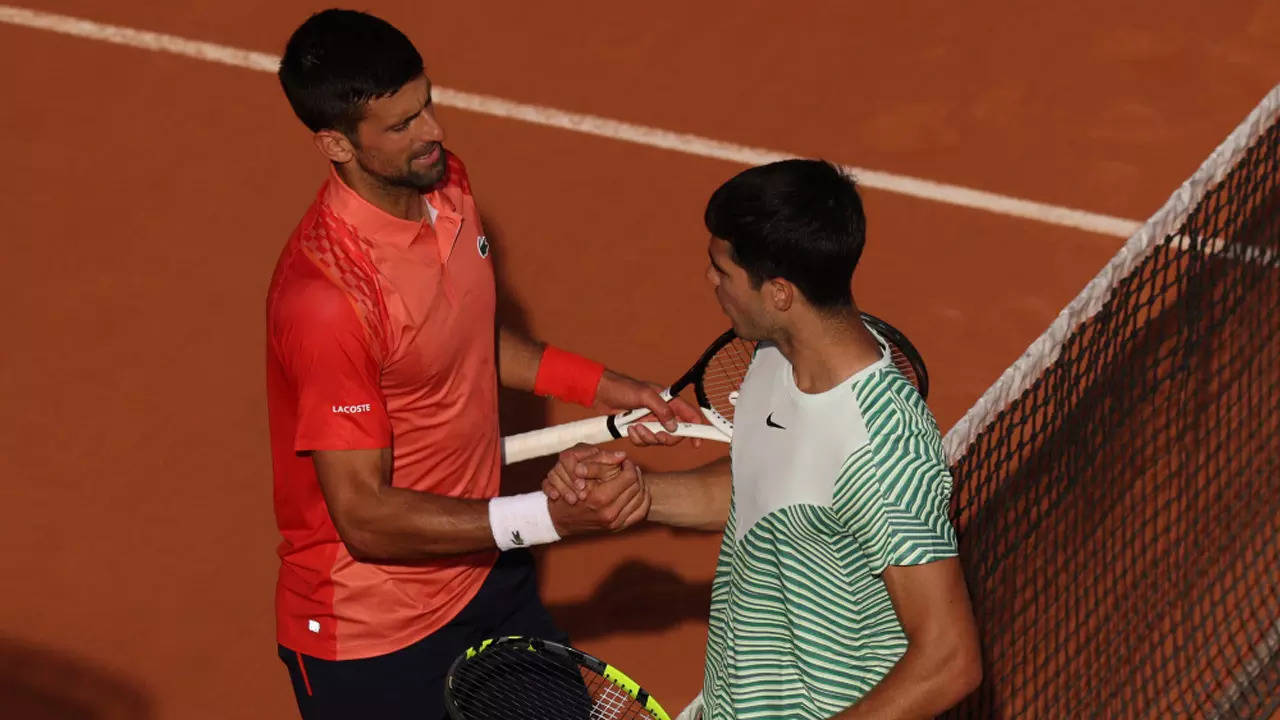 Novak Djokovic and Carlos Alcaraz (Photo by Clive Brunskill/Getty Images)