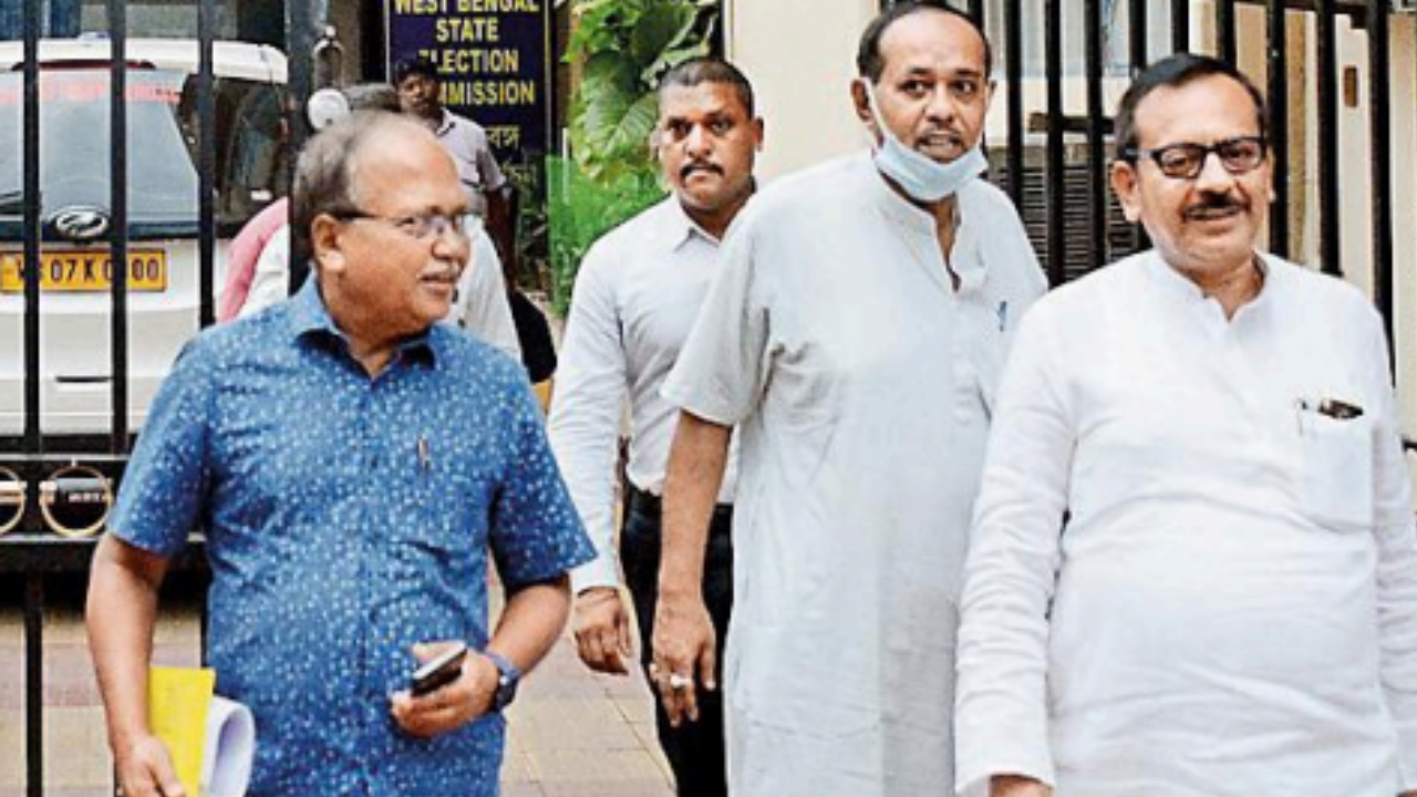 TMC leaders Aroop Biswas and Subrata Bakshi come out after attending the all-party meet at the State Election Commission office in Kolkata on Tuesda