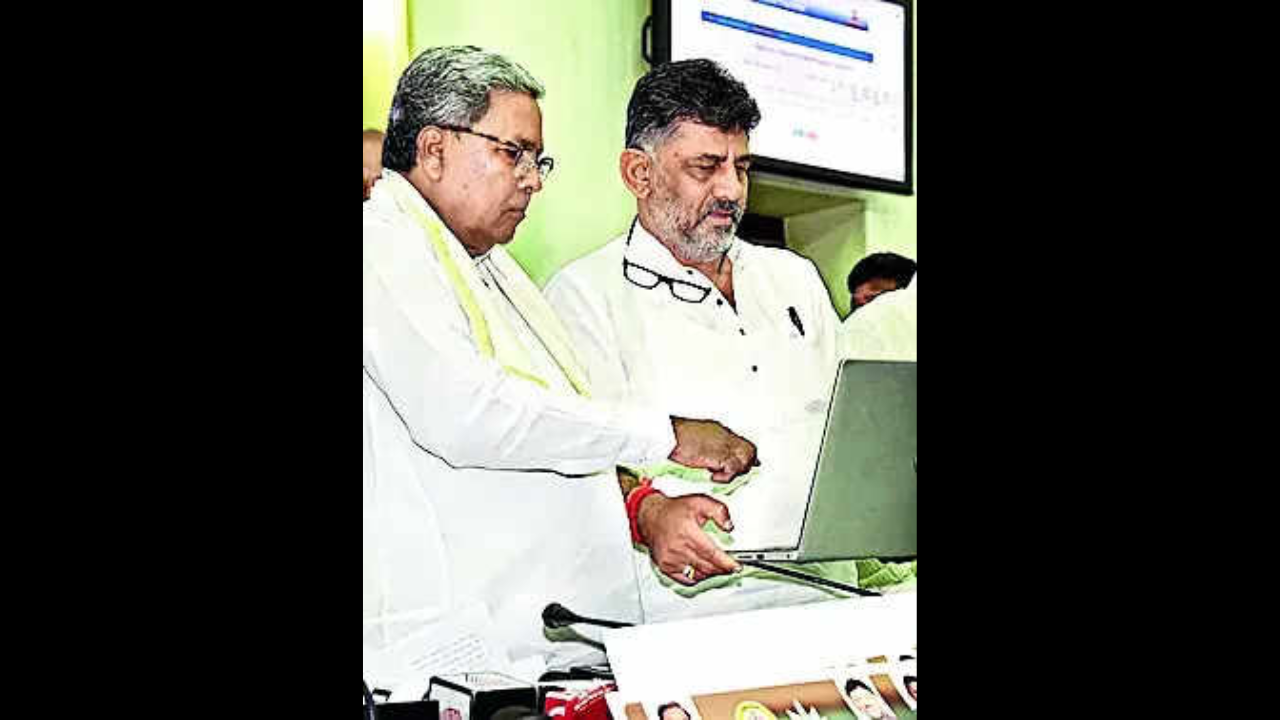 Anna Bhagya 2.0: CM launches cash transfer for 2 dists, rest by month-end | Bengaluru News – Times of India