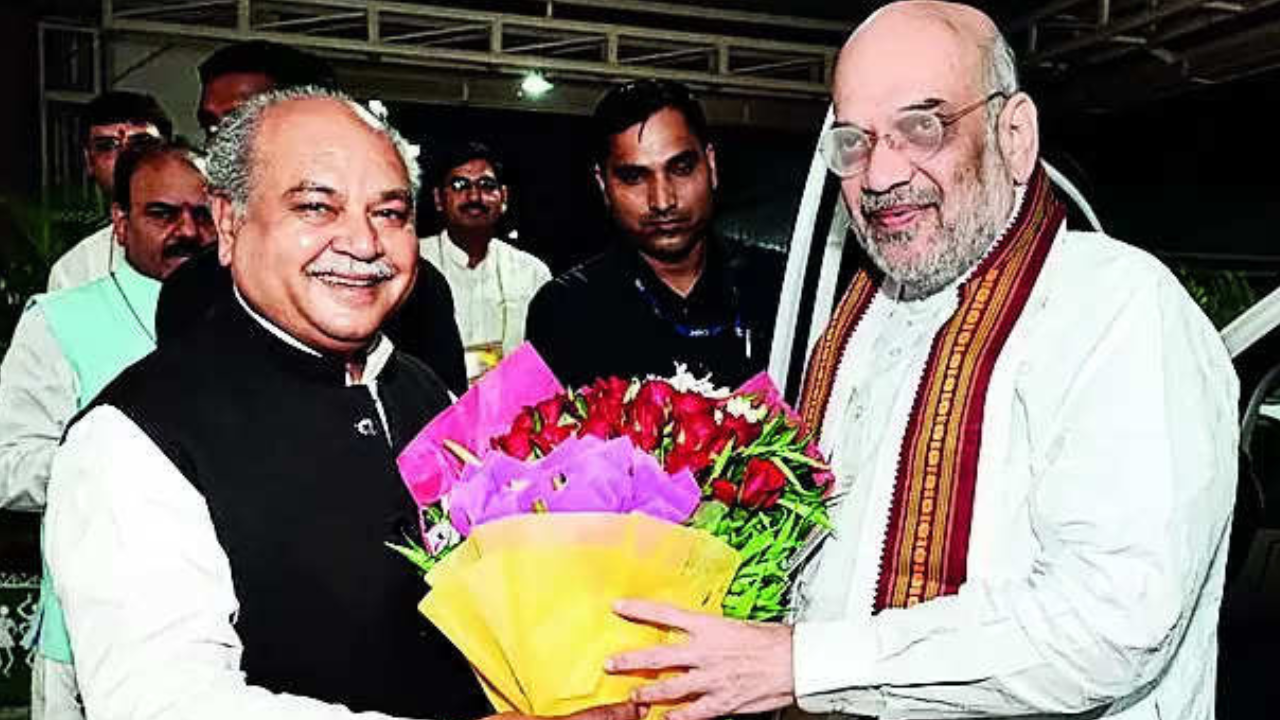 Union ministers Narendra Singh Tomar and Jyotiraditya Scindia welcome Union home minister Amit Shah during his visit to the state capital, on Wednesday 