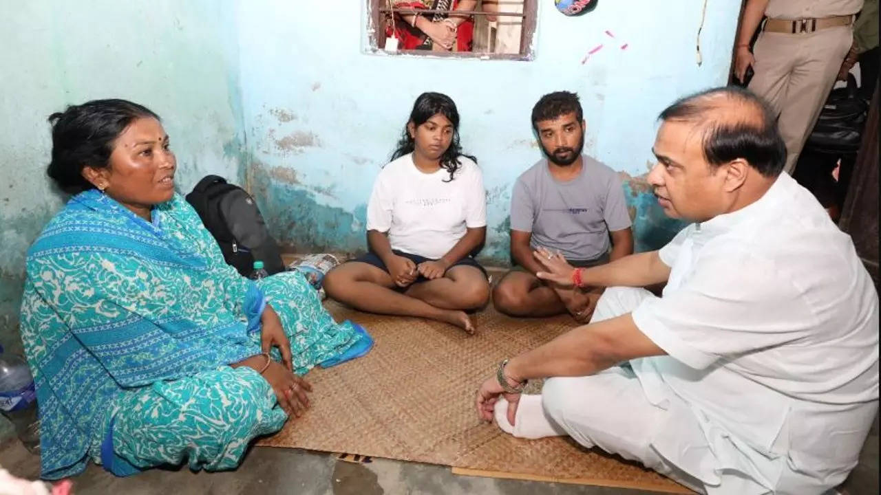 Assam chief minister Himanta Biswa Sarma meets with family members of the victims of the triple murder case in Golaghat on July 26. File photo
