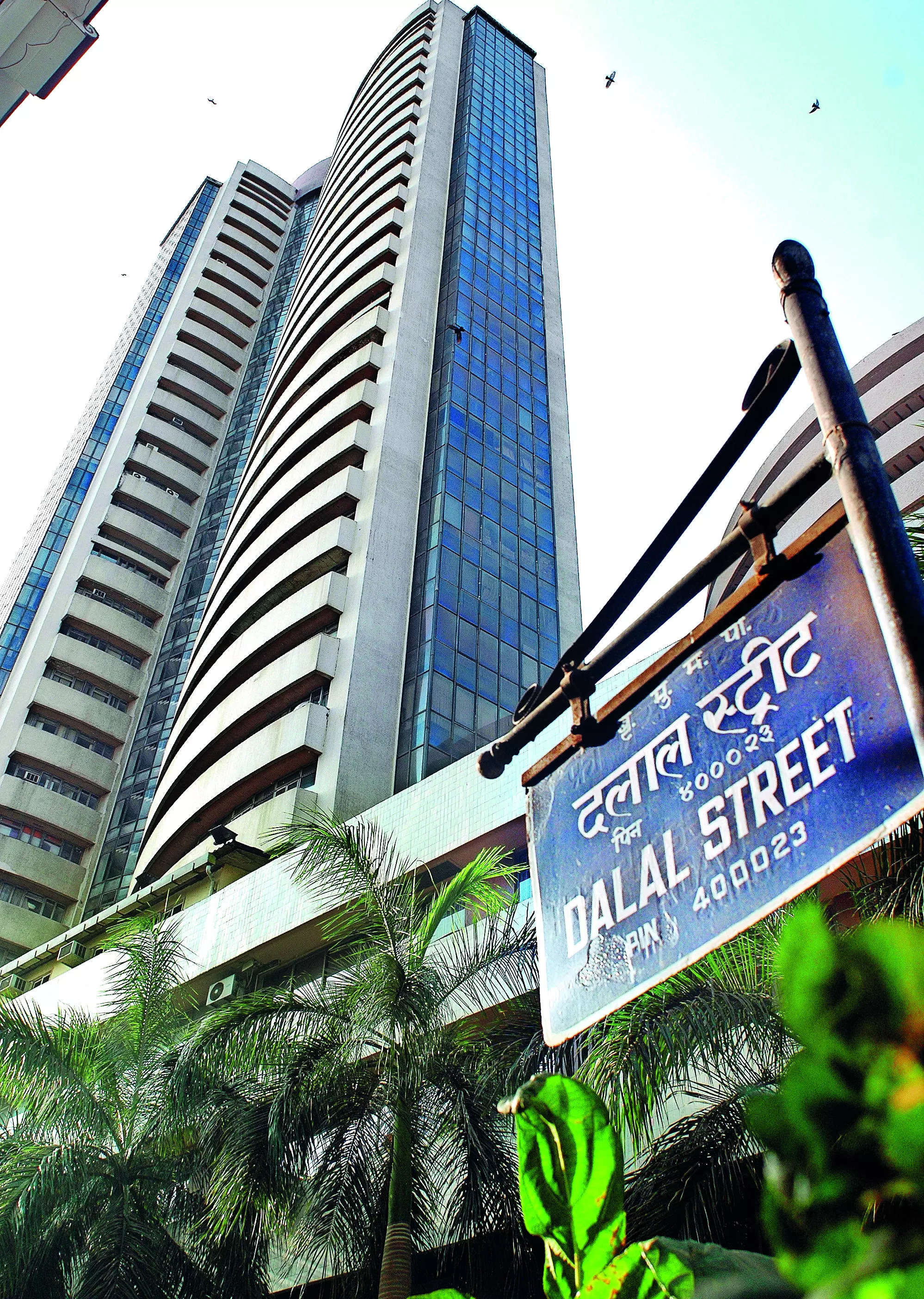 Sensex, Nifty settle higher ahead of RBI’s policy decision