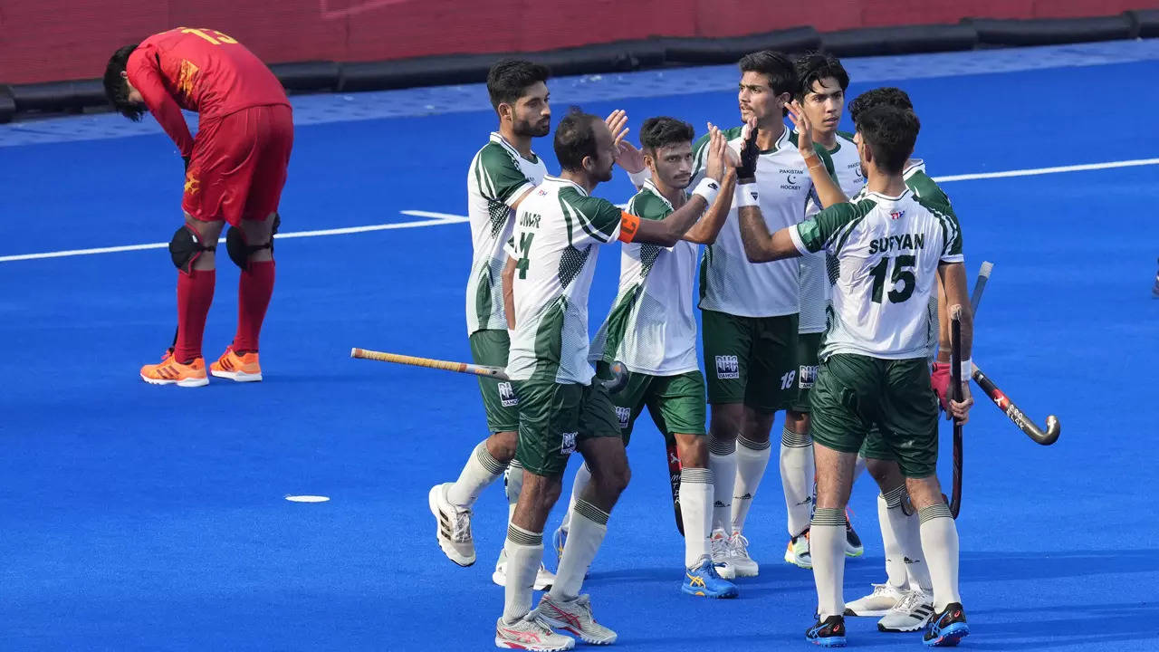 Pakistan's Ammad Muhammad celebrates with teammates after scoring a goal. (PTI Photo)