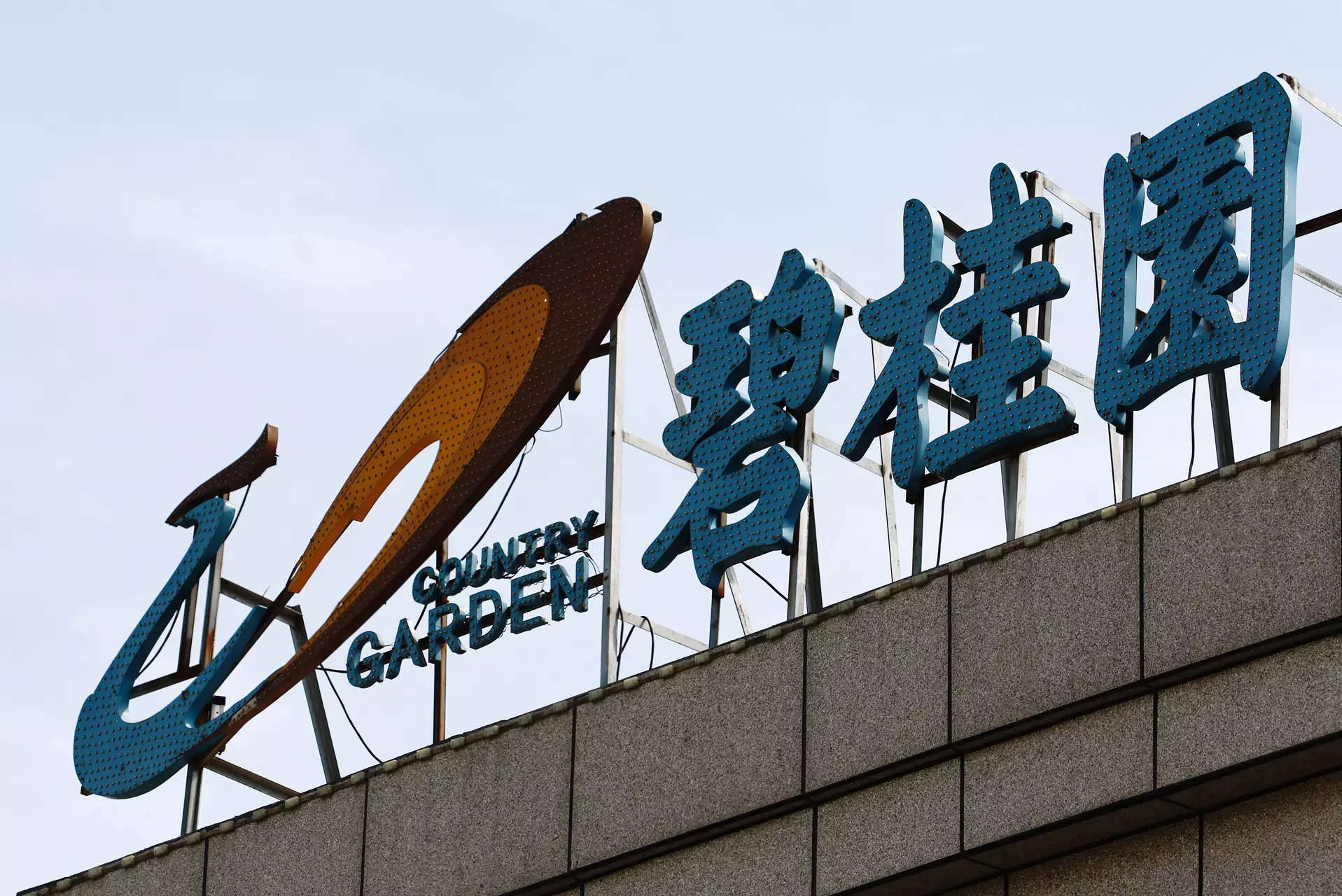 China’s Country Garden posts record loss, warns of possible default