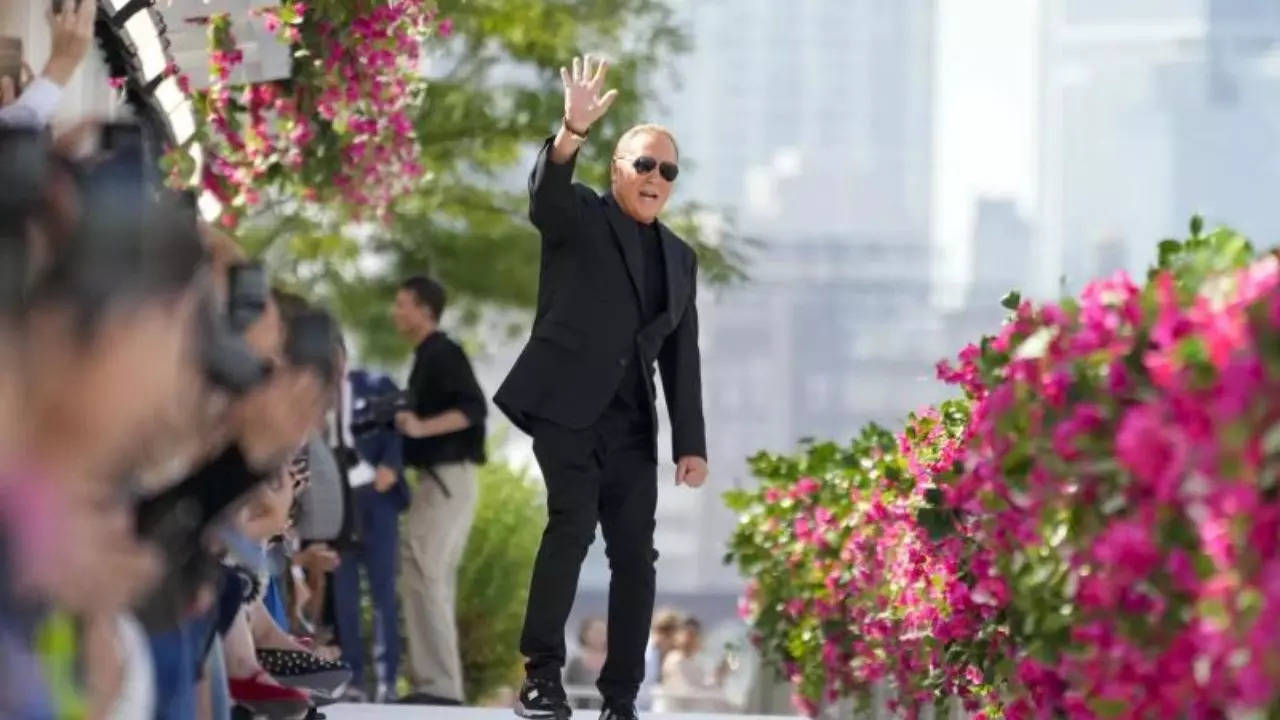 Designer Michael Kors acknowledges the audience applause after his collection was modeled during Fashion Week, Monday, Sept. 11, 2023, in New York. (AP Photo/Mary Altaffer)