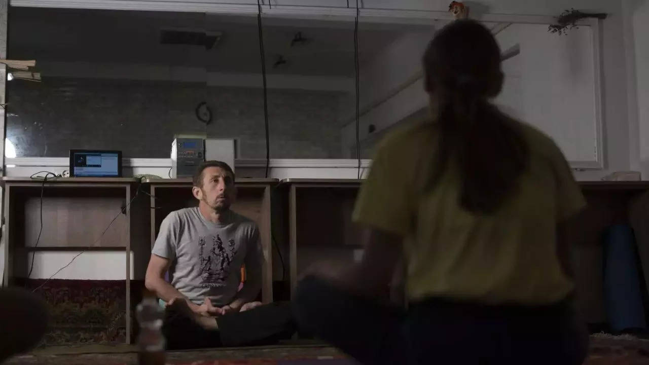 Yoga in a basement helps people in a Ukrainian front-line city cope with Russia's constant shelling