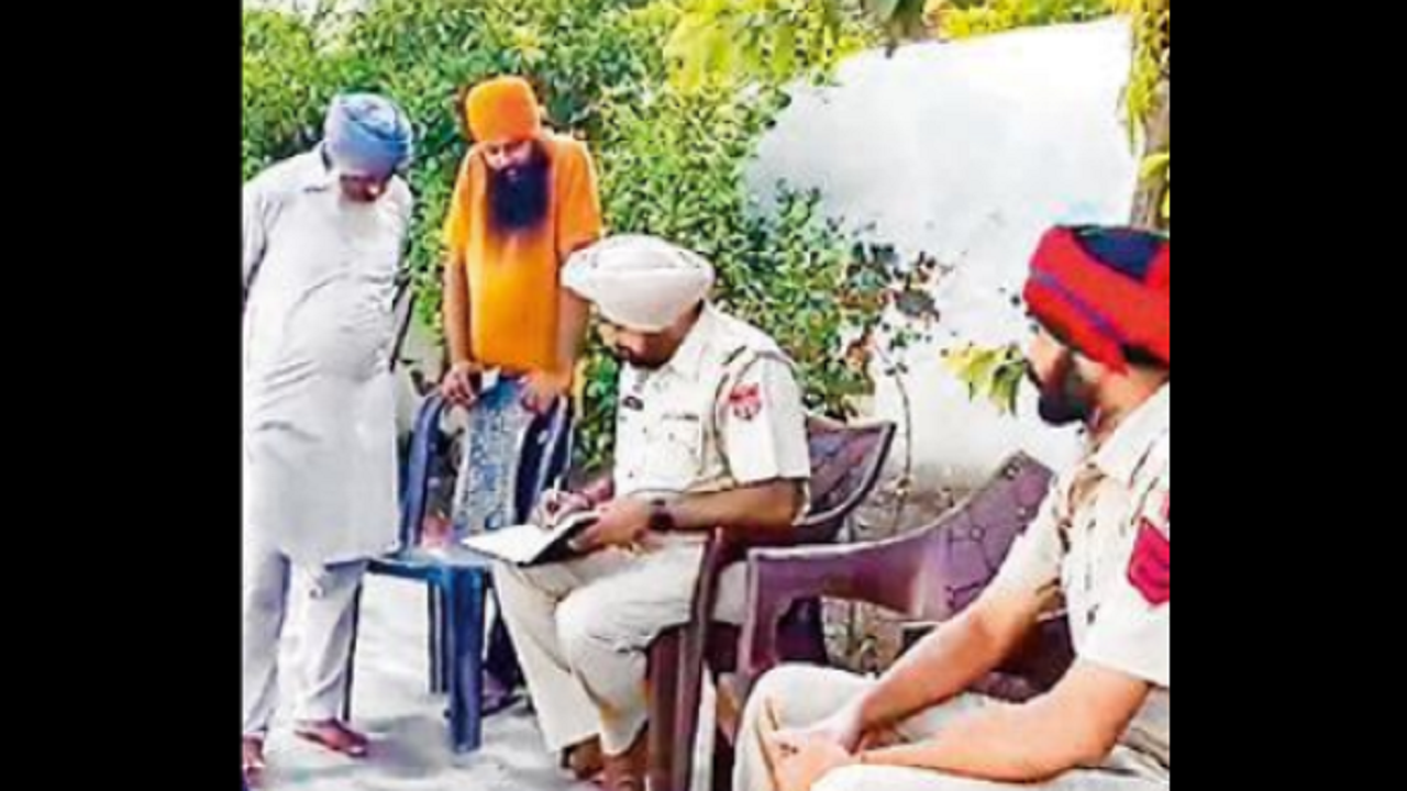 Police officials at Sukha Duneke’s residence in Moga on Thursday