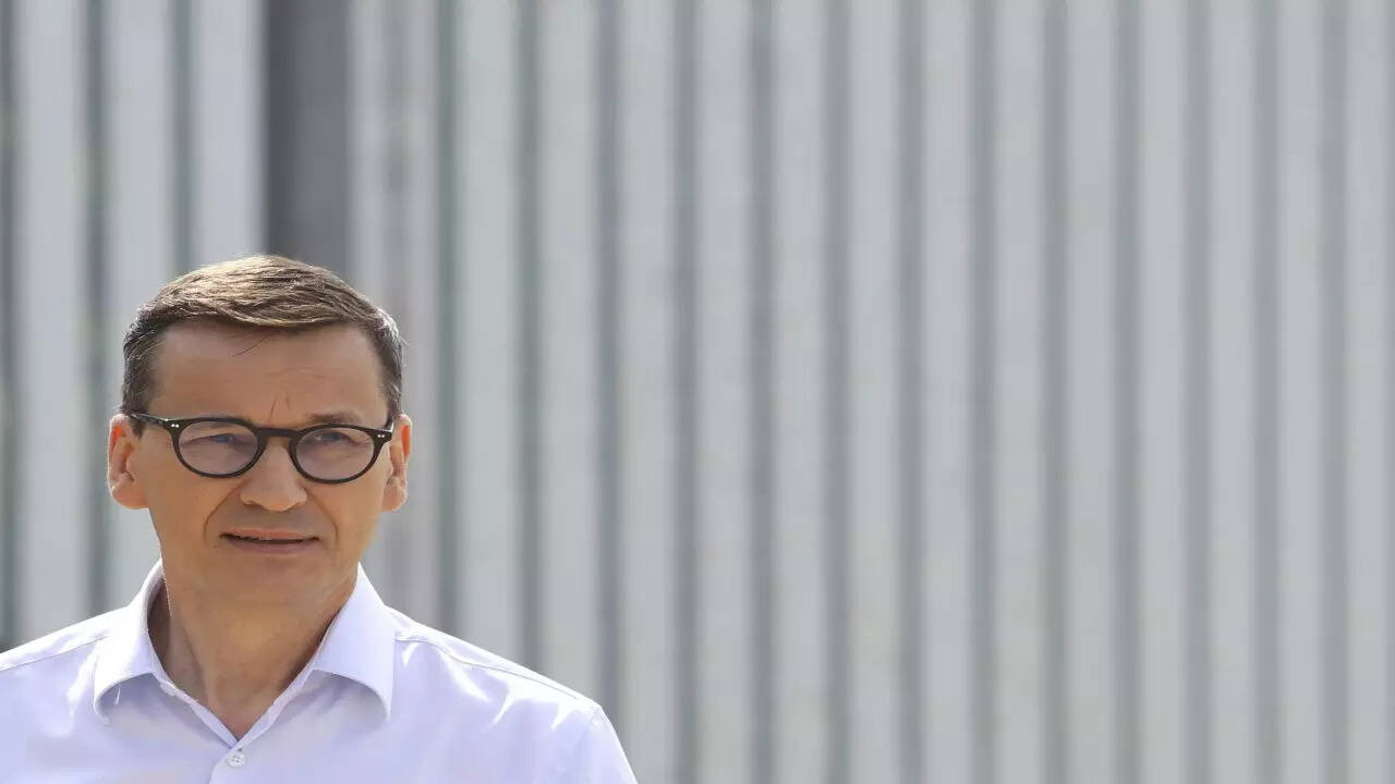 Poland calls visa scandal an exaggerated 'media fact' to discredit government