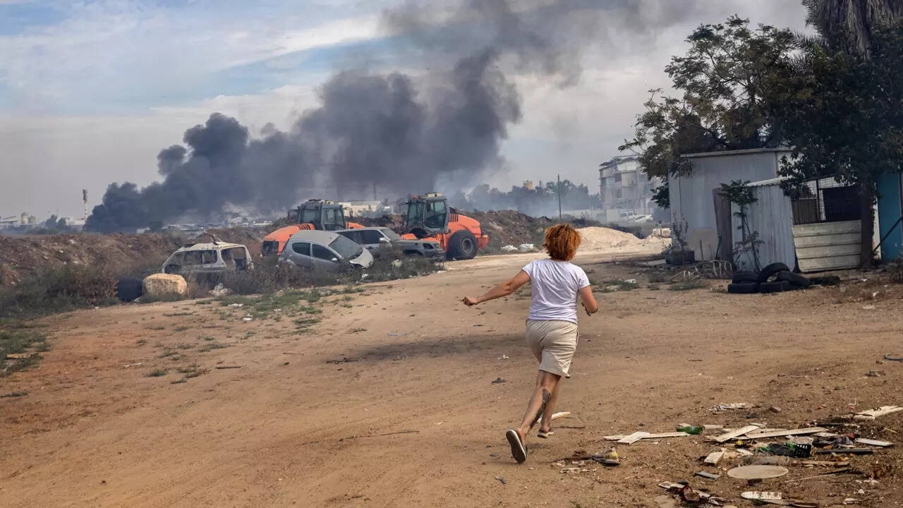 Israelis beg for help as Hamas militants barge into homes