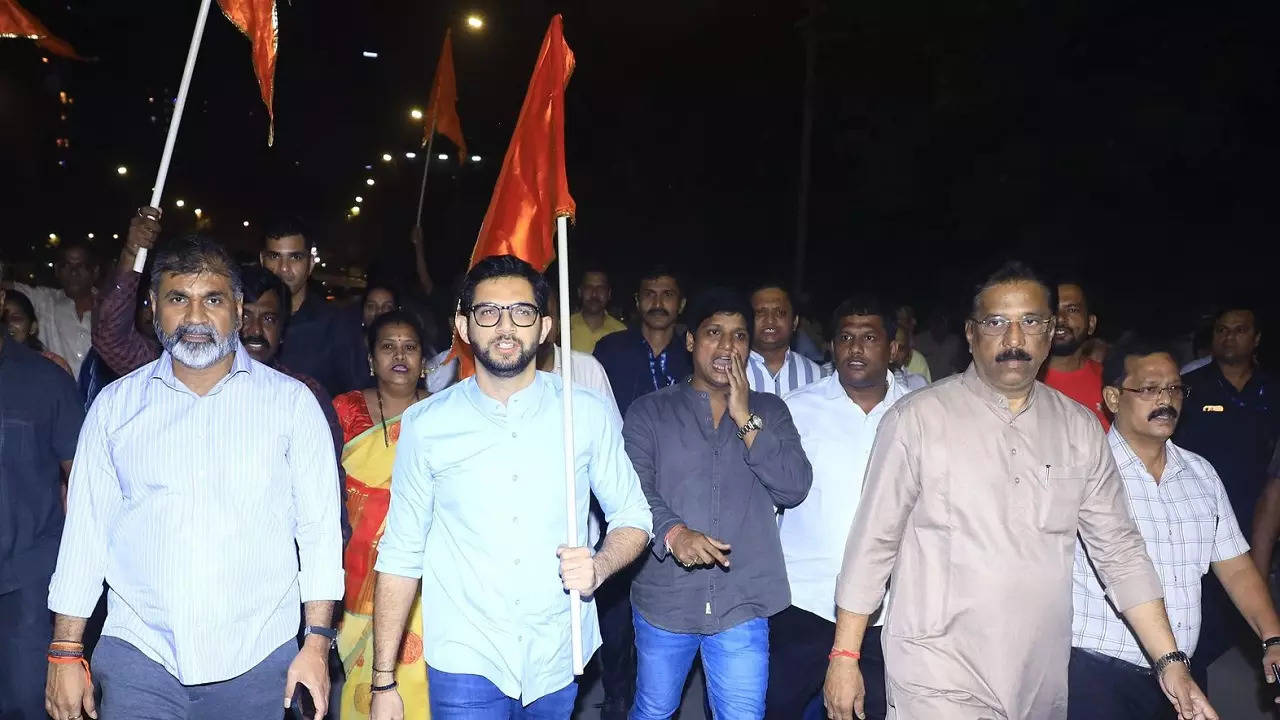 L to R: Sachin Ahir, Aaditya Thackray and Shiv Sena (UBT) workers during the opening of Lower Parel’s Delisle bridge.
