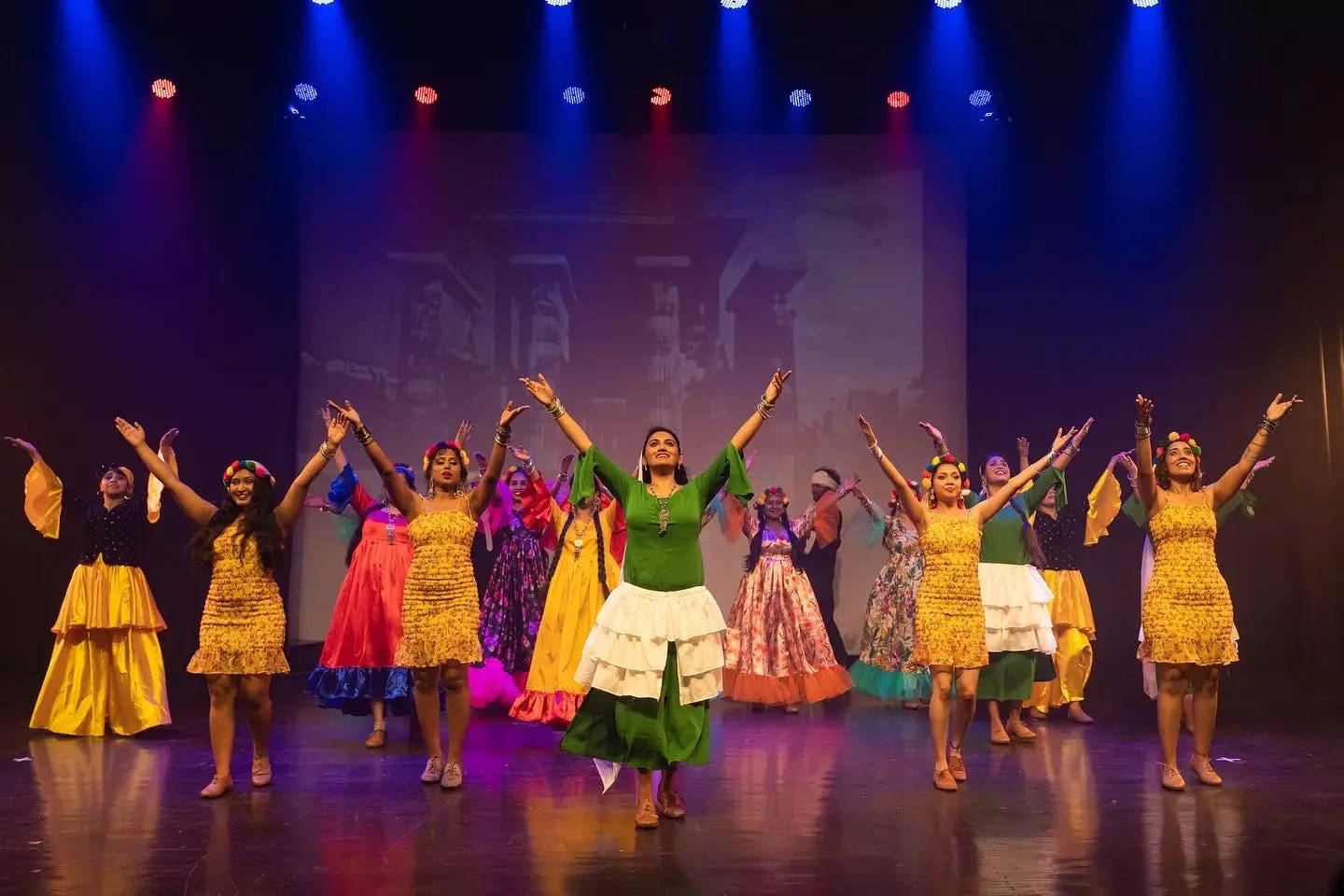 The cast shimmy on stage during a musical number