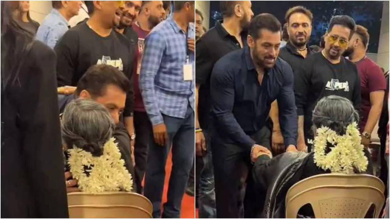 Salman touches Usha Uthup's feet at Umang 2023