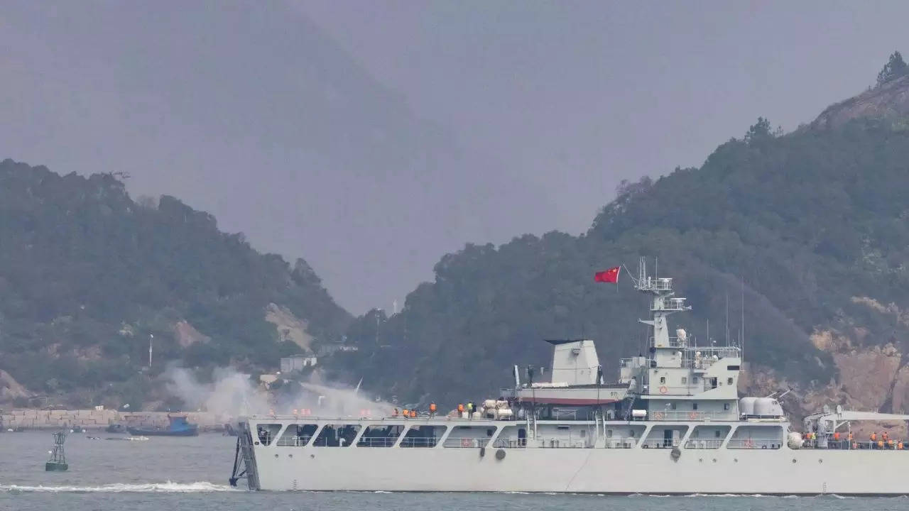 China unveils a new naval chief as maritime tensions climb