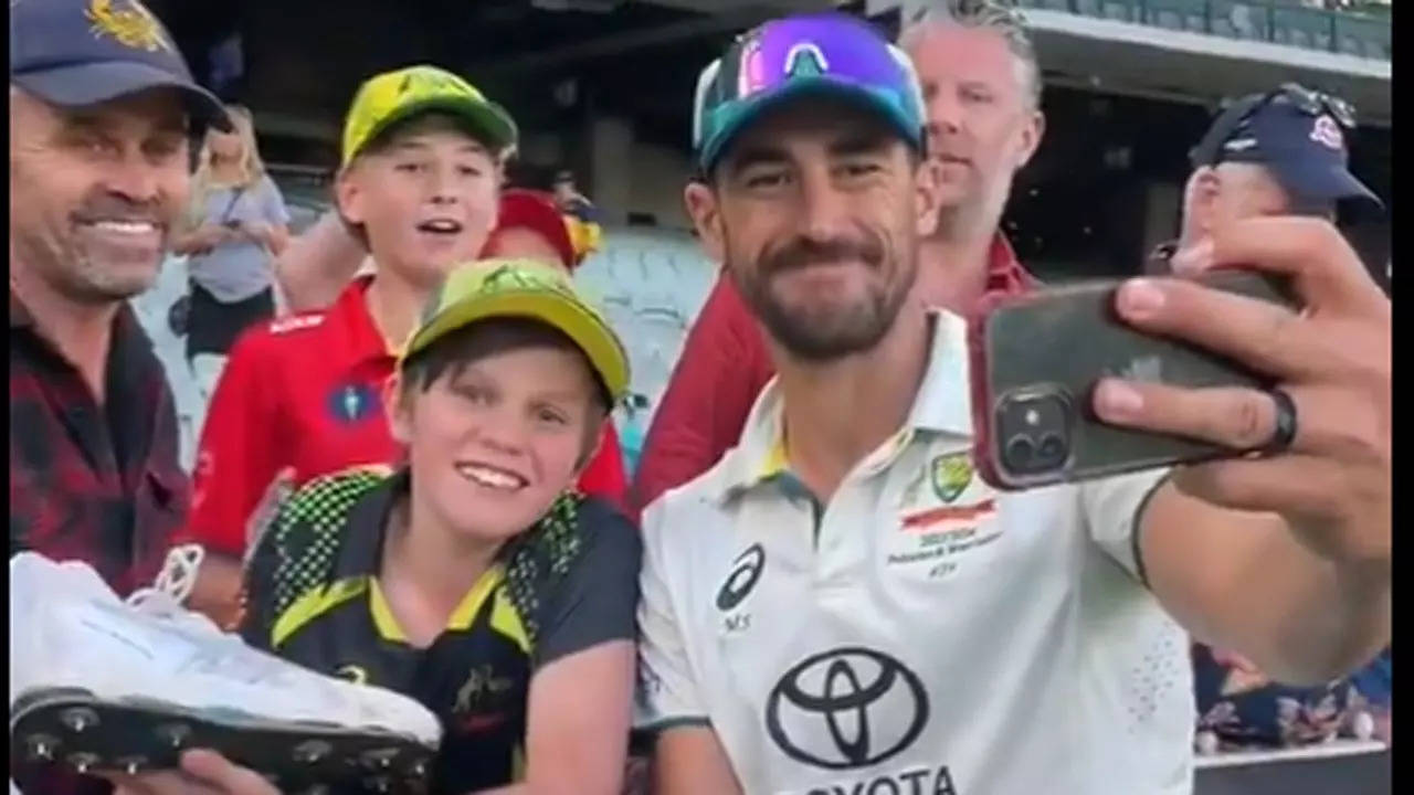 WATCH: Mitchell Starc fulfills his promise, provides signed footwear to younger fan | Cricket Information – Instances of India