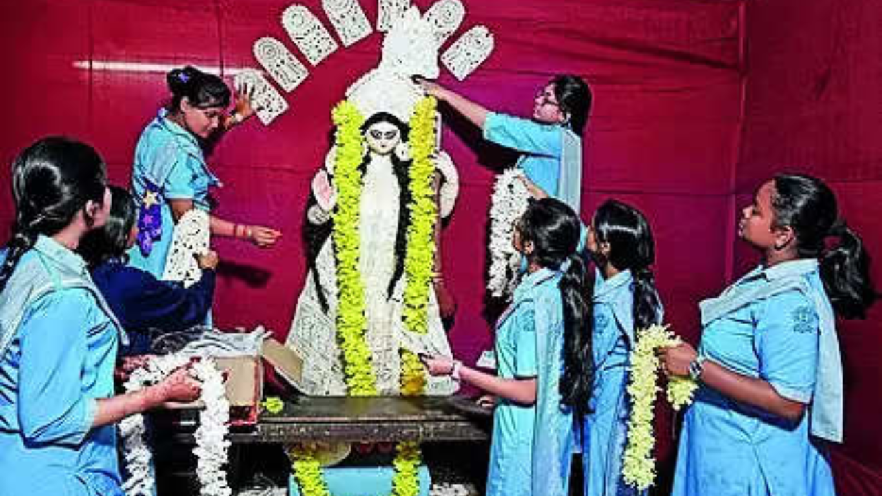 Sarat Chandra Paul Girls’ High School students decorate the Saraswati idol on Tuesday