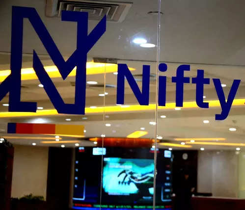 Sensex, Nifty trade flat amid mixed global cues