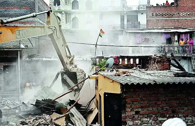 LDA razes 78 slum houses to pave way for Kukrail riverfront project | – Times of India